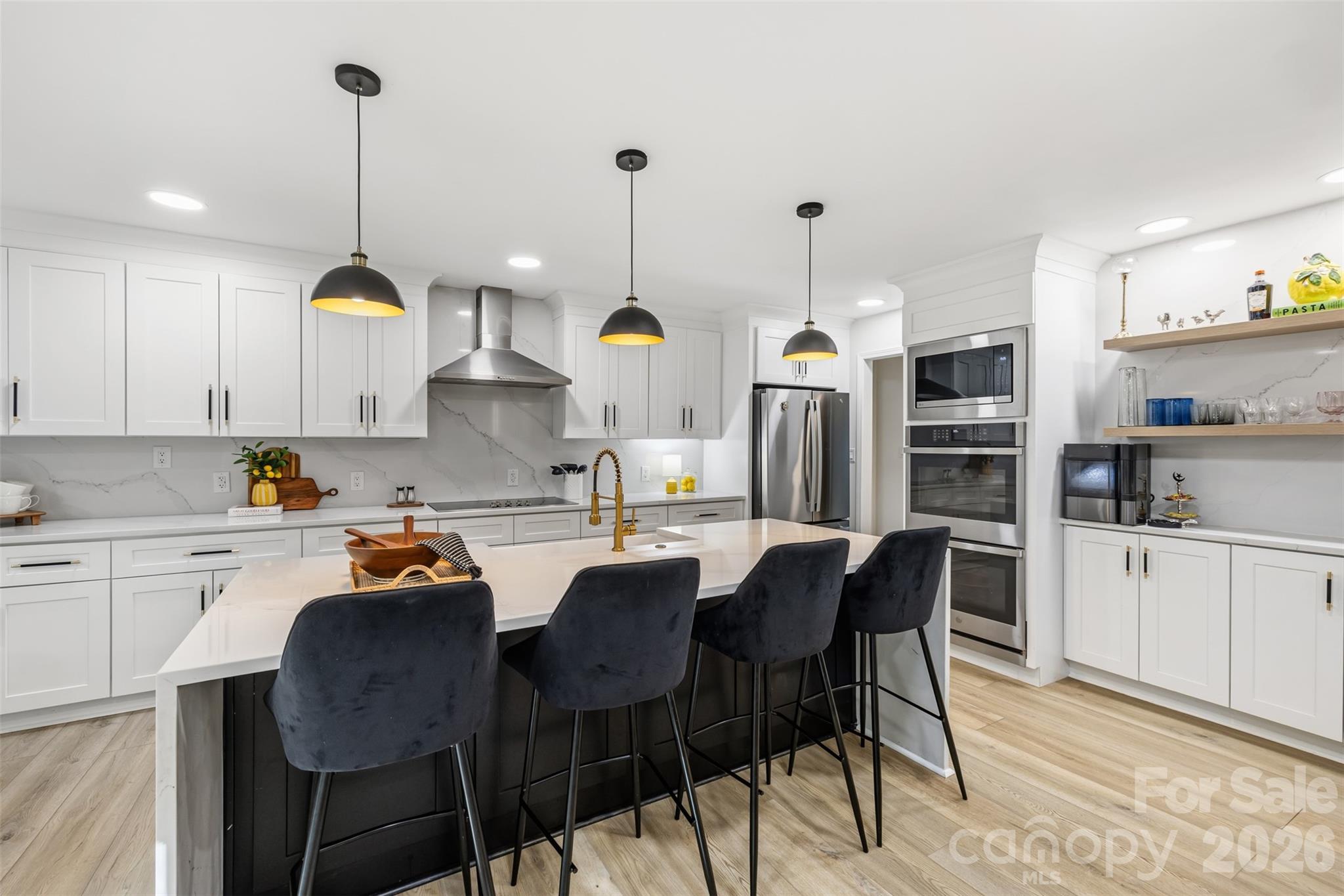 Beautiful Quartz countertops and a waterfall island with seamless backsplash brings the WOW - 16 Tanglewood Road, Lake Wylie