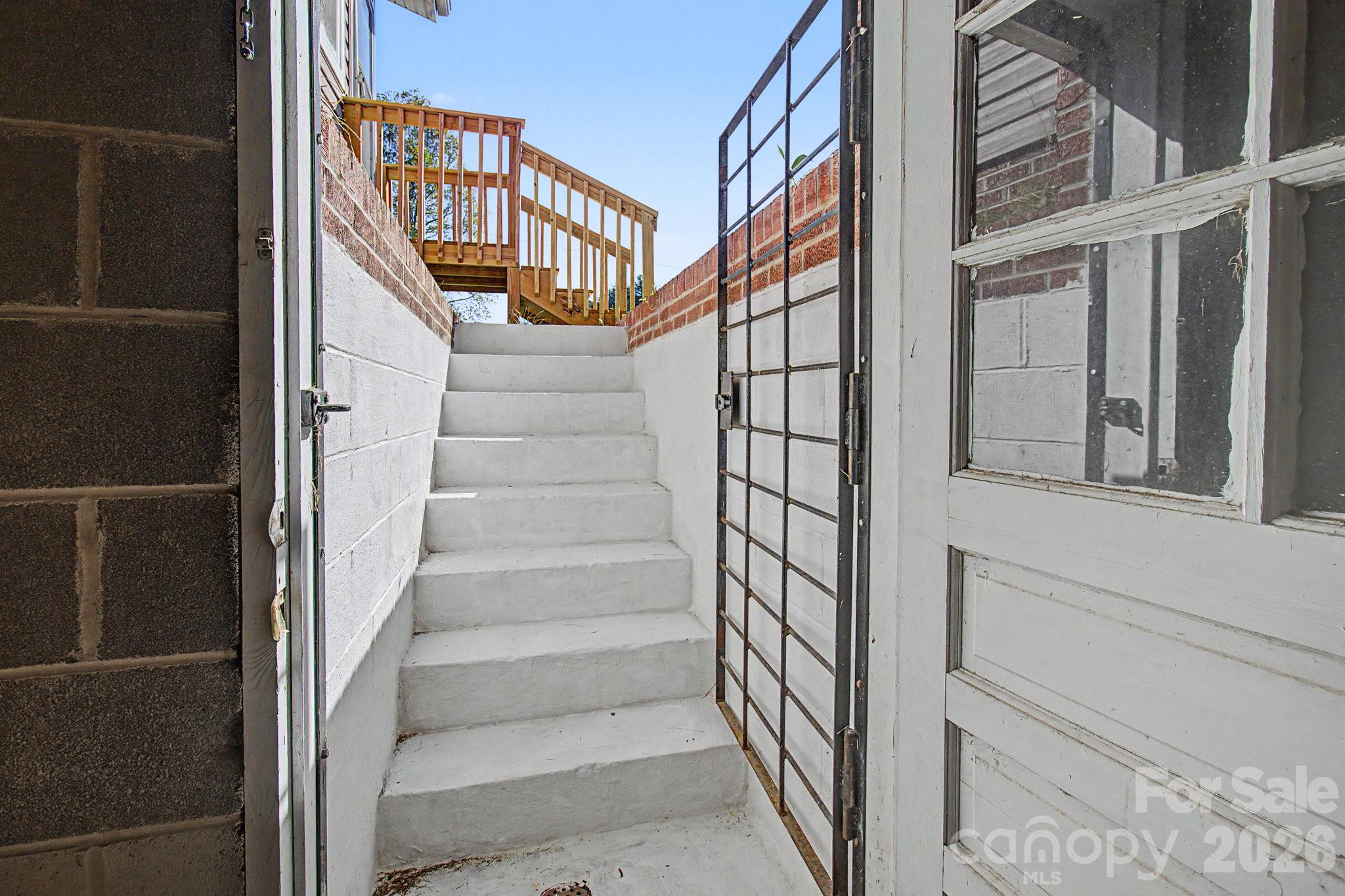 Secure basement stairs going out back - 188 Pinner Road, Arden