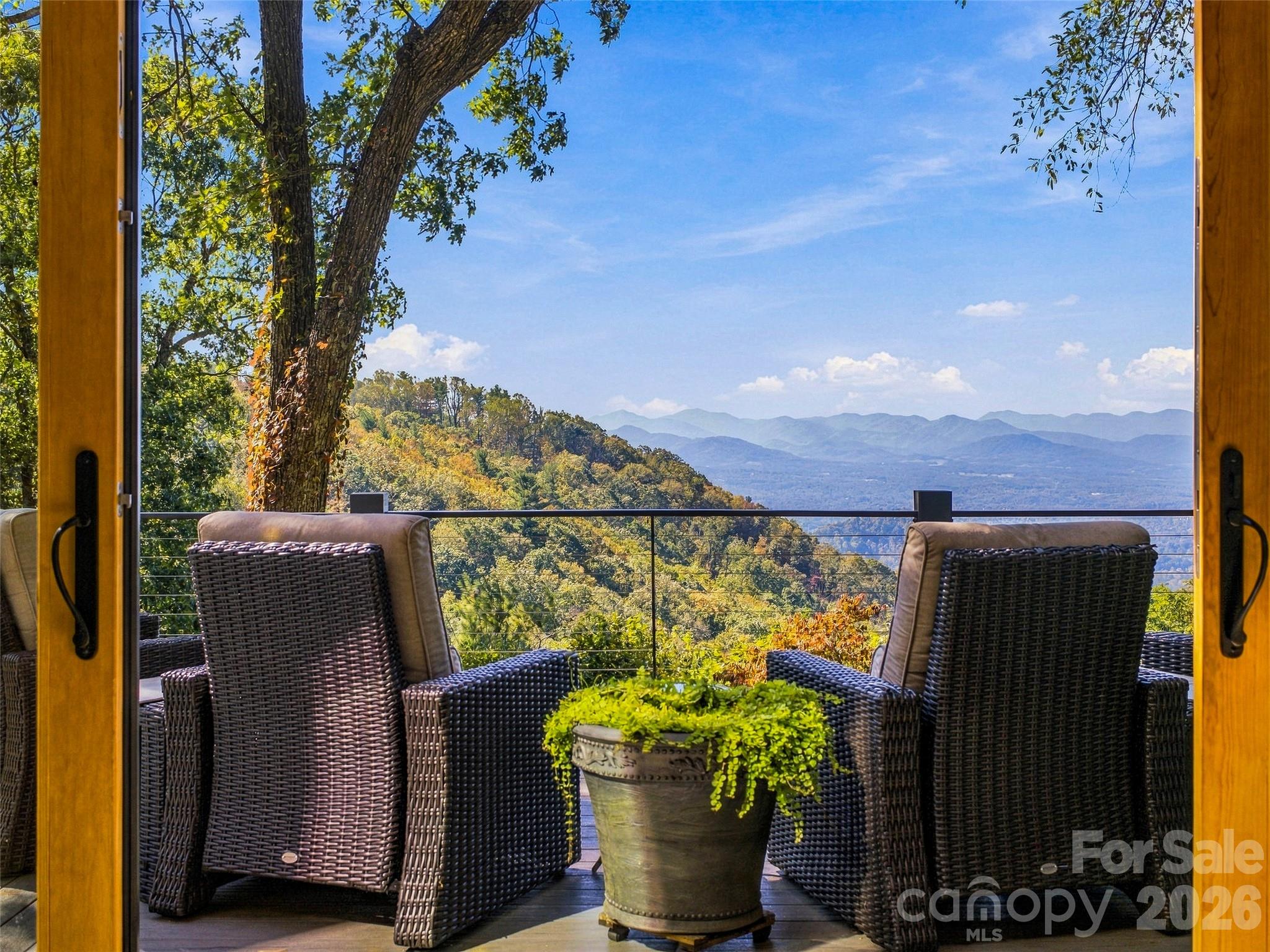 These views from the primary suite - 21 Peach Knob Drive, Asheville