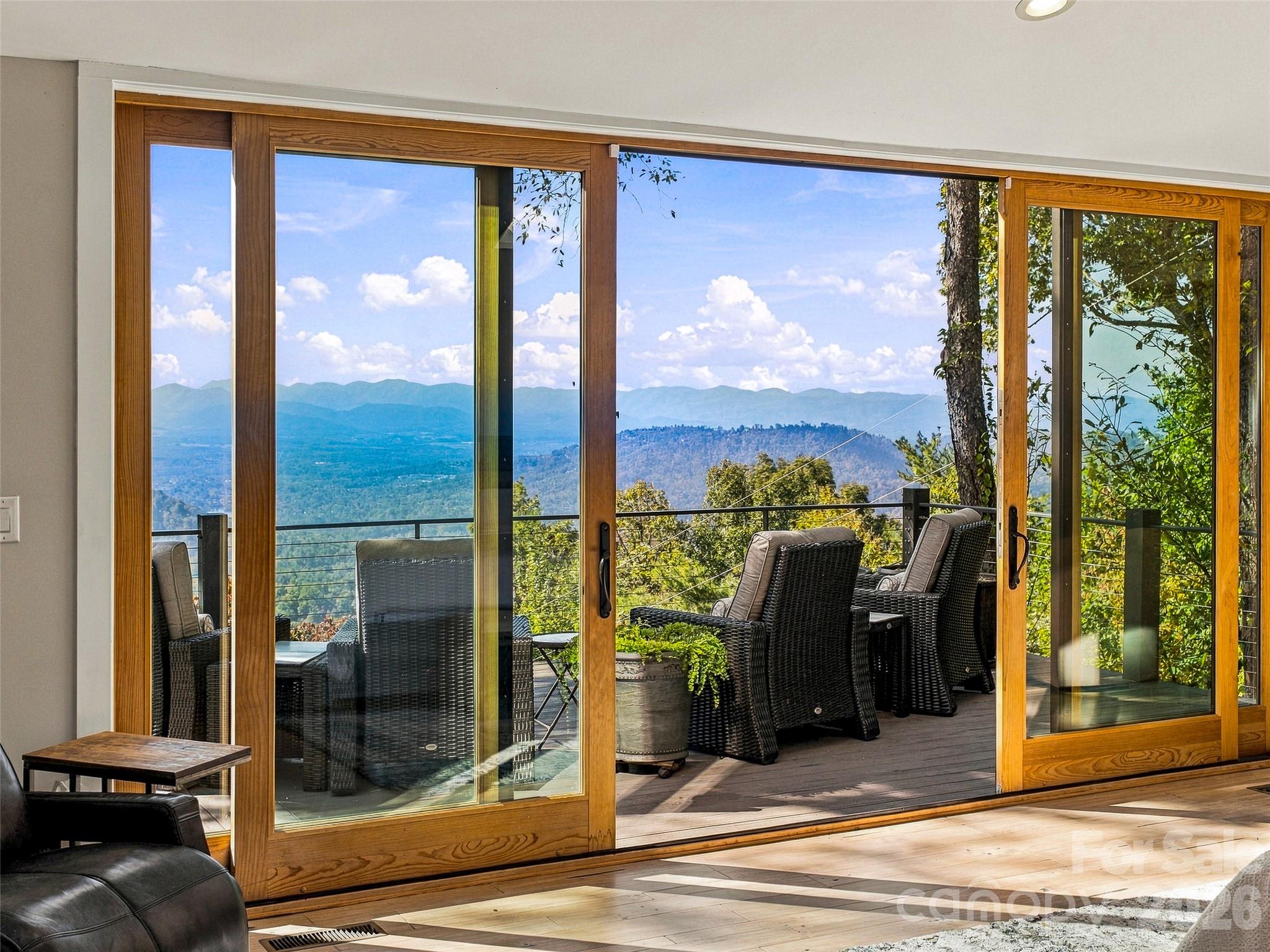 Wonderful deck access from the primary suite - 21 Peach Knob Drive, Asheville