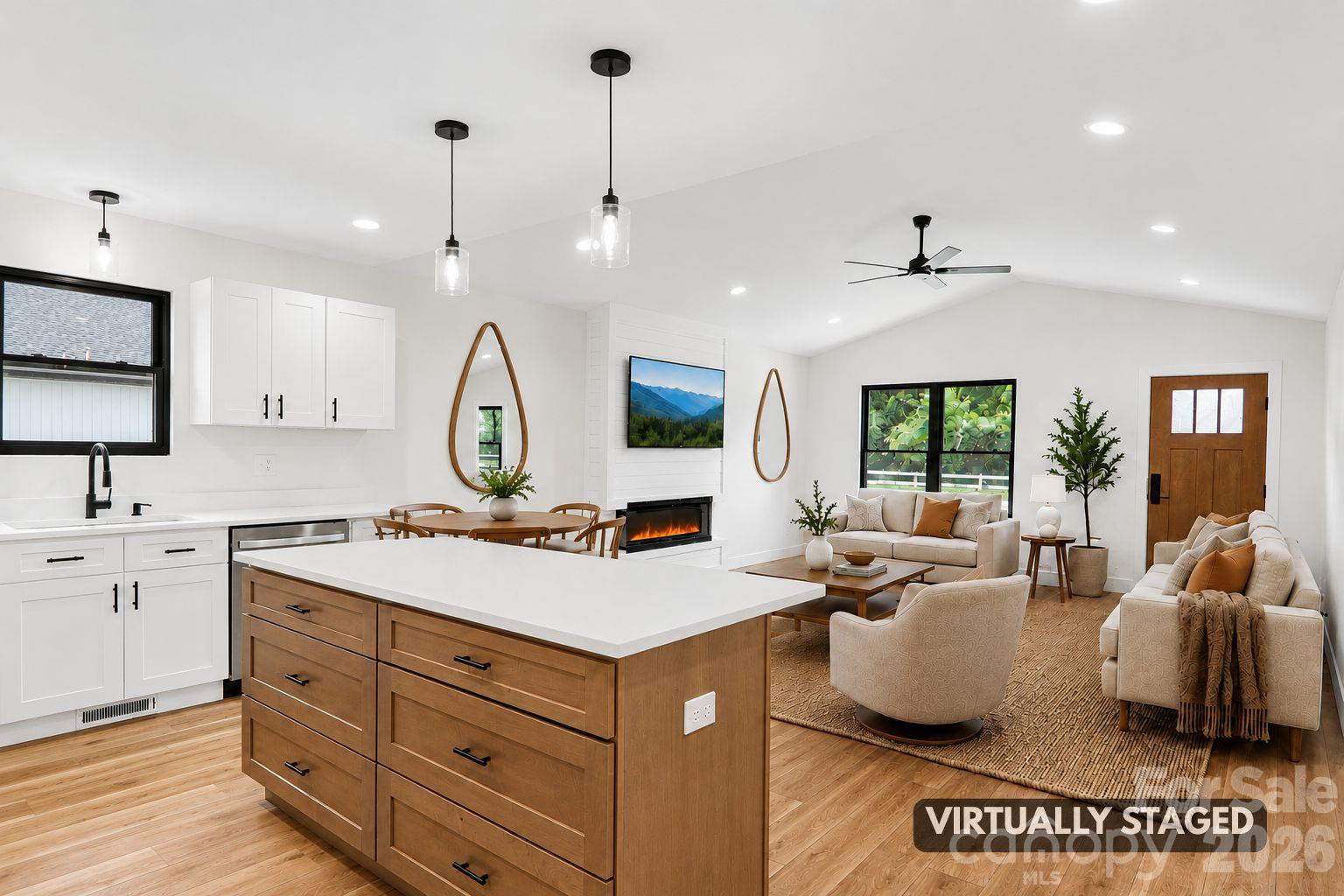 Virtually Staged Kitchen island with seating and custom drawer base cabinet with soft close. - 140 N Main Street, Mars Hill