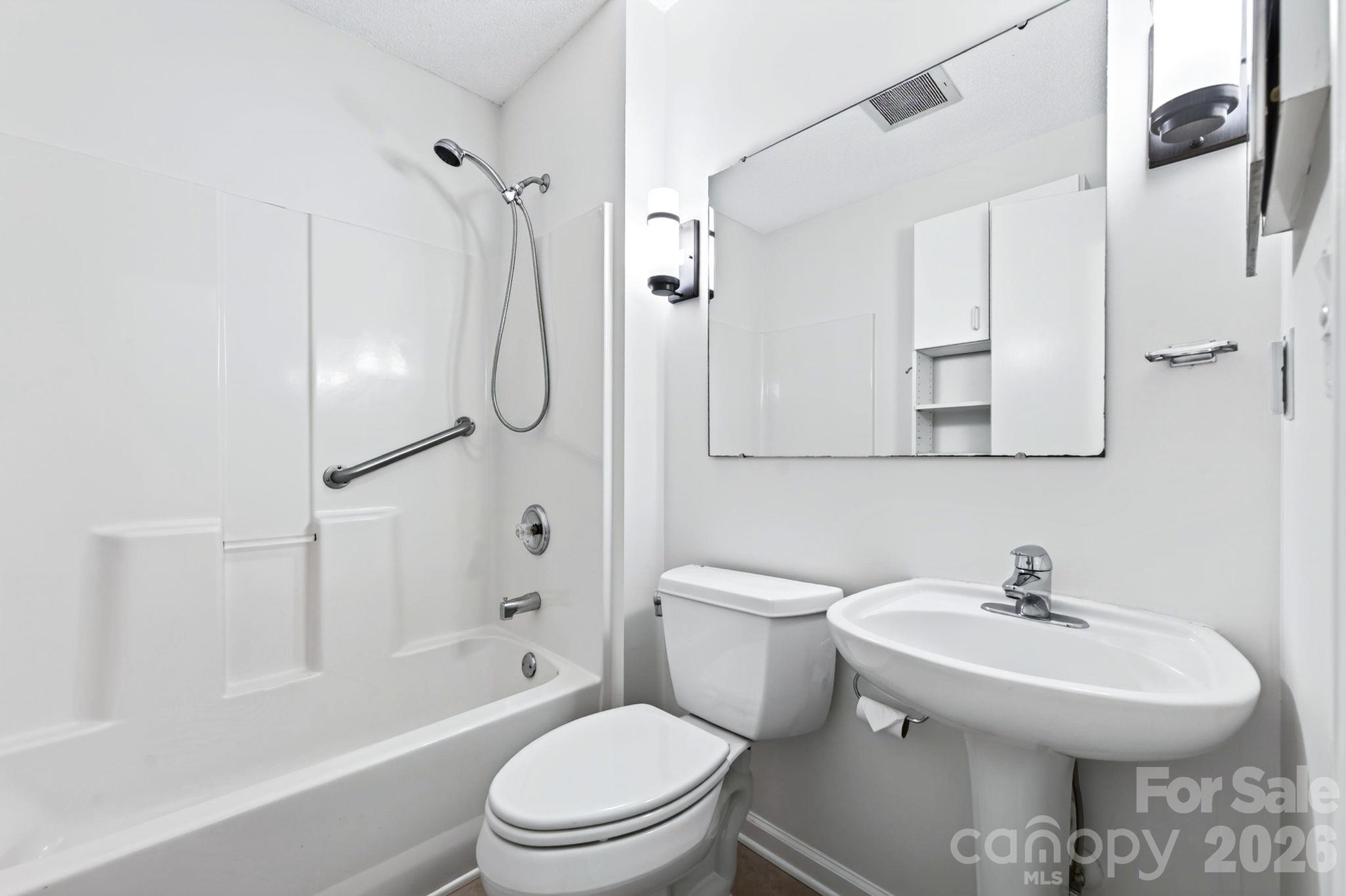 Lower level bathroom includes shower and tub - 43 Vermont Court, Asheville