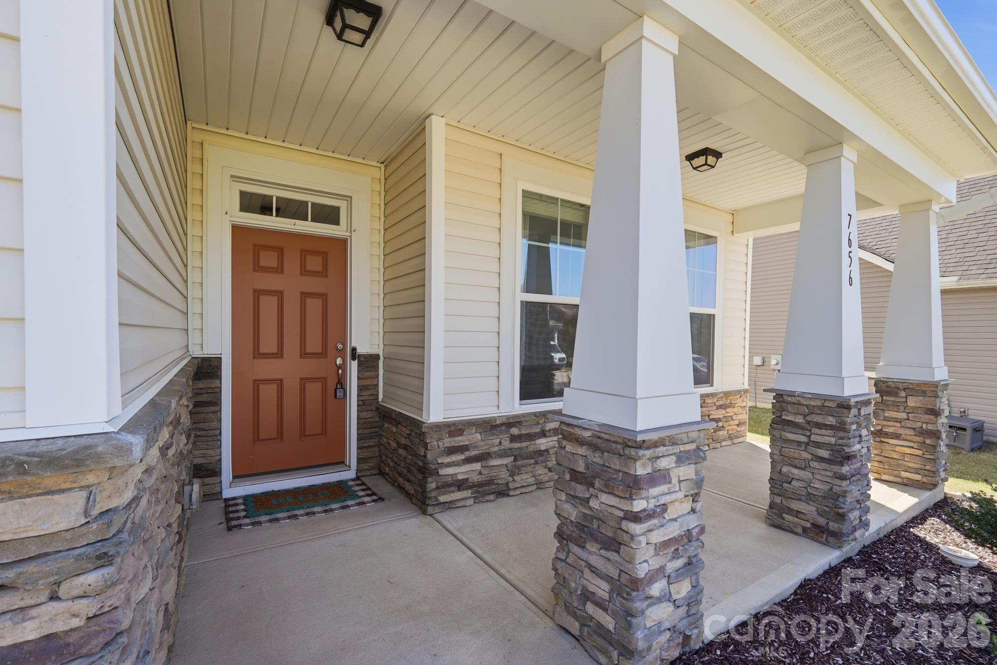 Covered front porch - 7656 Tanglewood Way, Denver