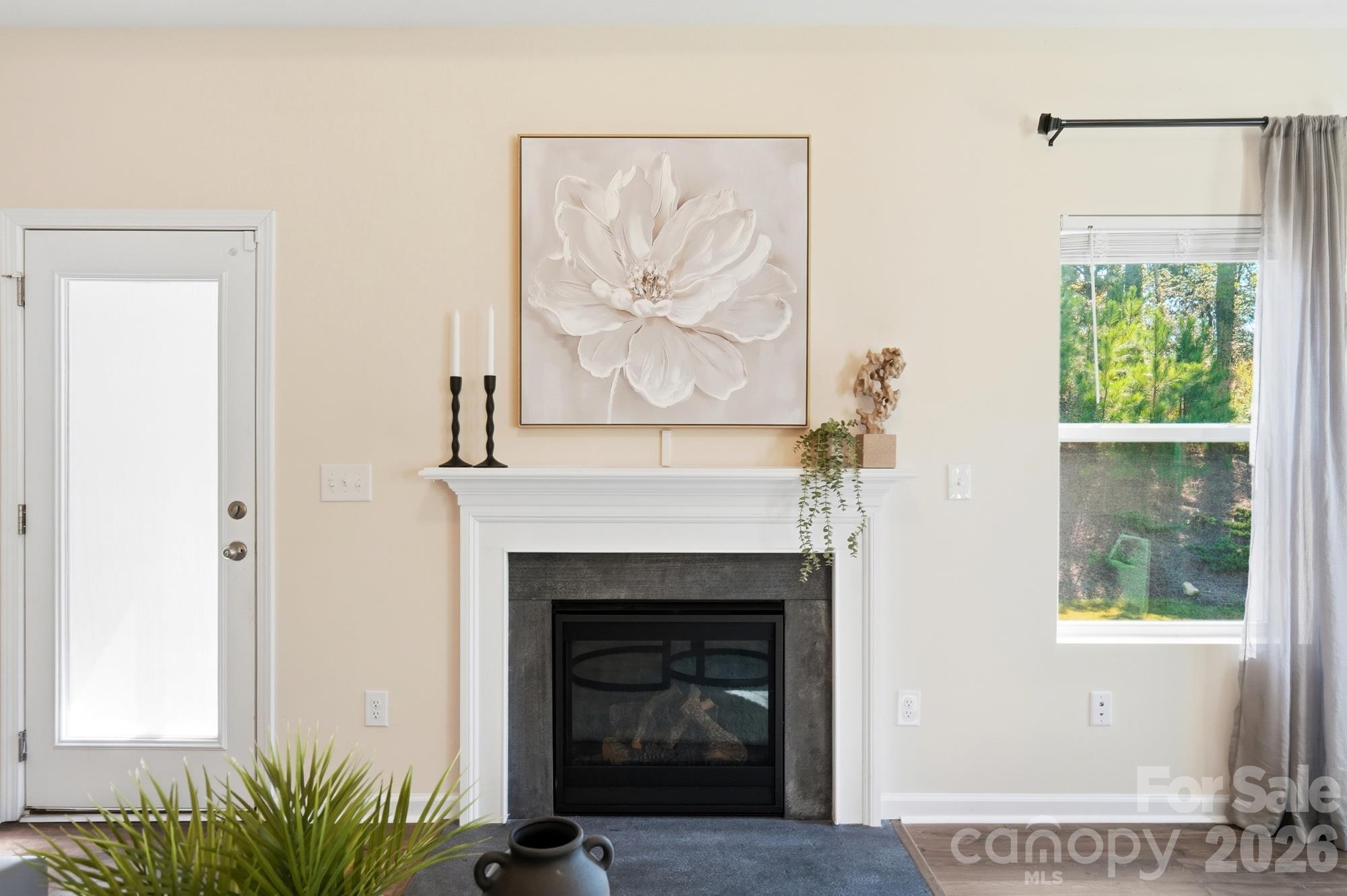 Gas fireplace in the living room - 7656 Tanglewood Way, Denver