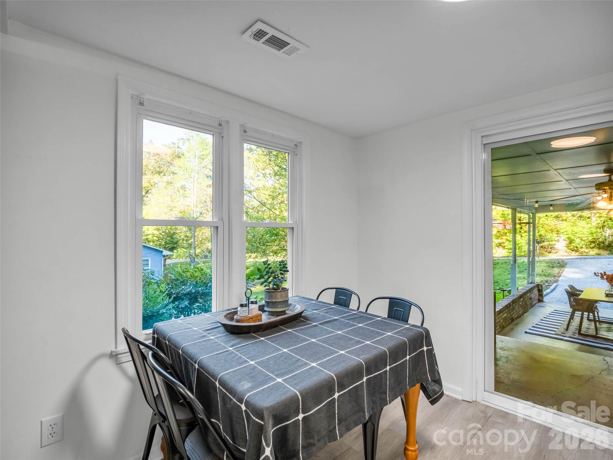 Enjoy meals with a view of the outdoors. - 913 Dorothy Street, Hendersonville