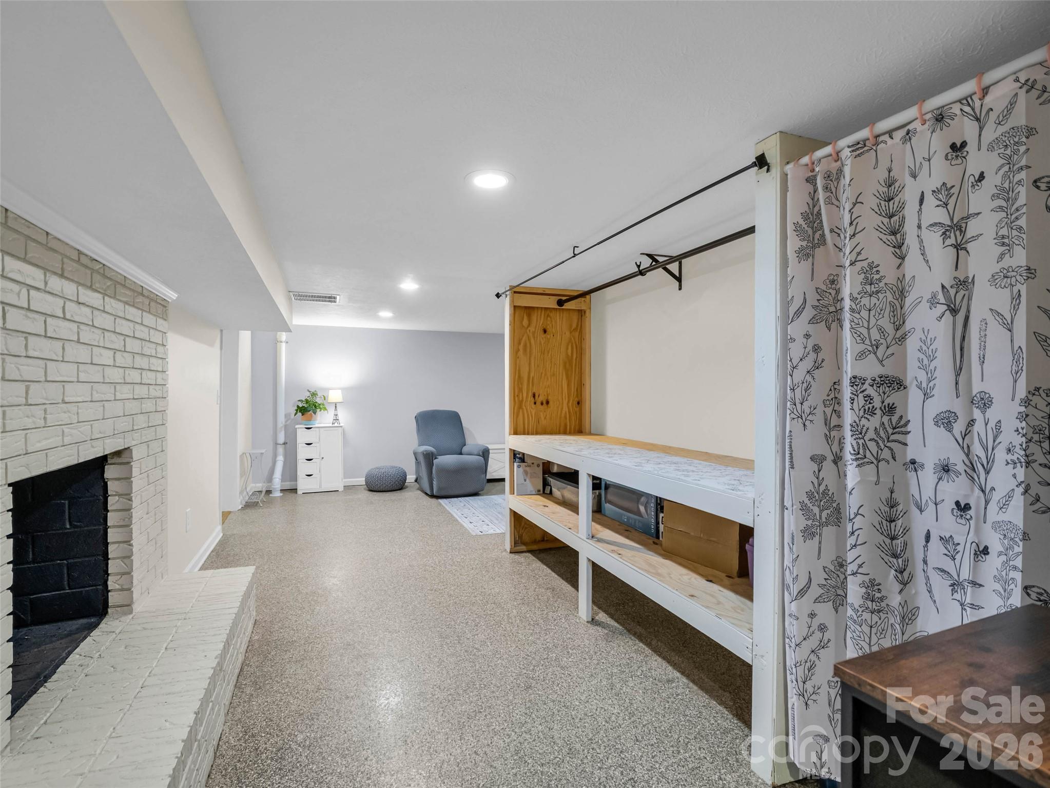 The lower level offers an entirely new set of possibilities. - 913 Dorothy Street, Hendersonville