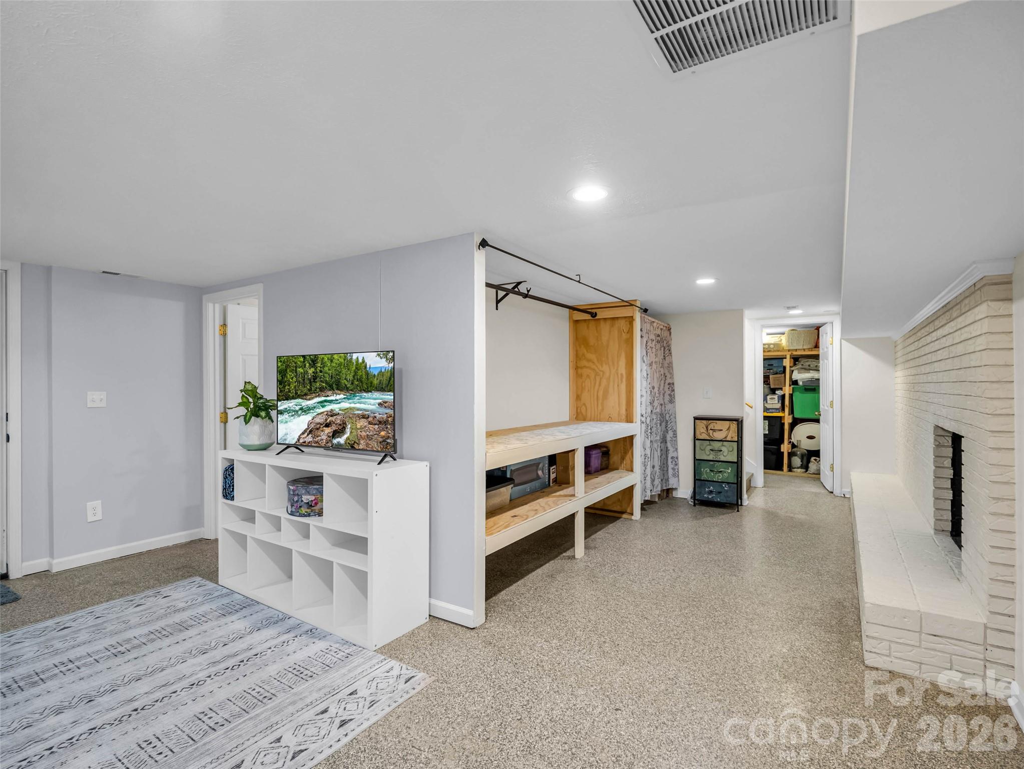 A finished downstairs living area with room to spread out. - 913 Dorothy Street, Hendersonville