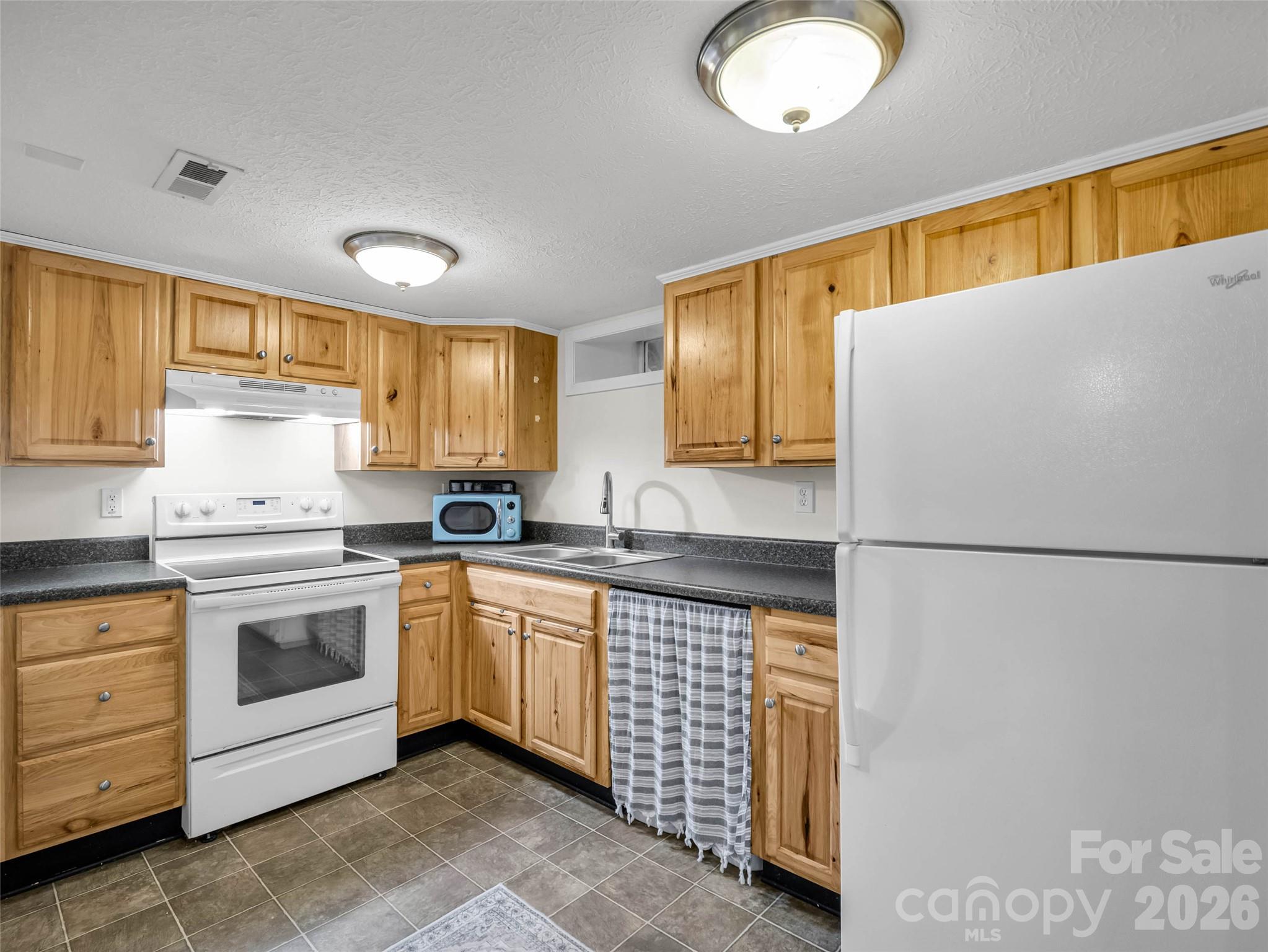 A fully equipped second kitchen for added flexibility. - 913 Dorothy Street, Hendersonville