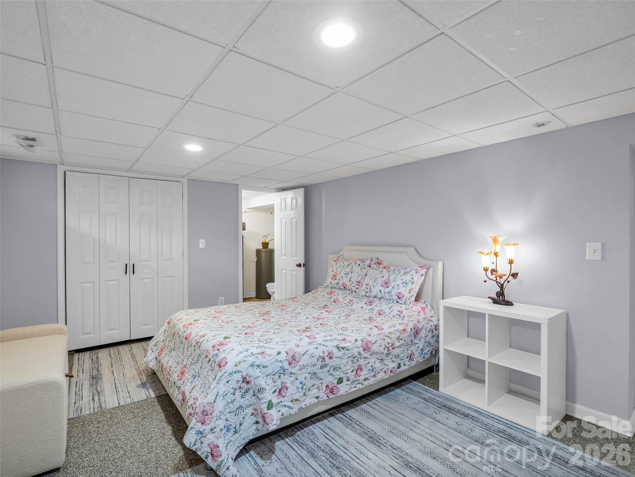Another view of the downstairs bedroom and its finished space. - 913 Dorothy Street, Hendersonville