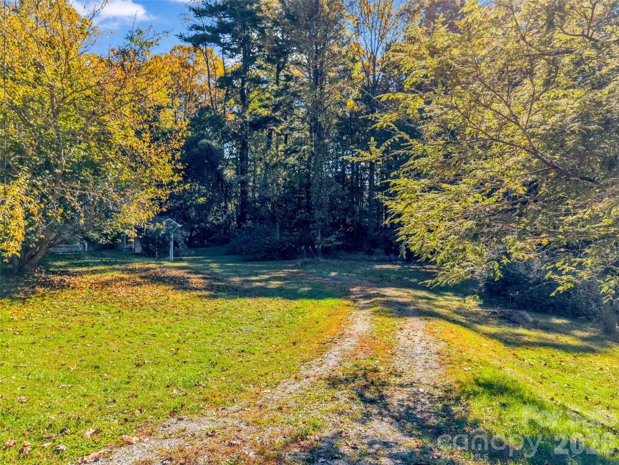 Separate driveway access offers convenience for the lower level. - 913 Dorothy Street, Hendersonville