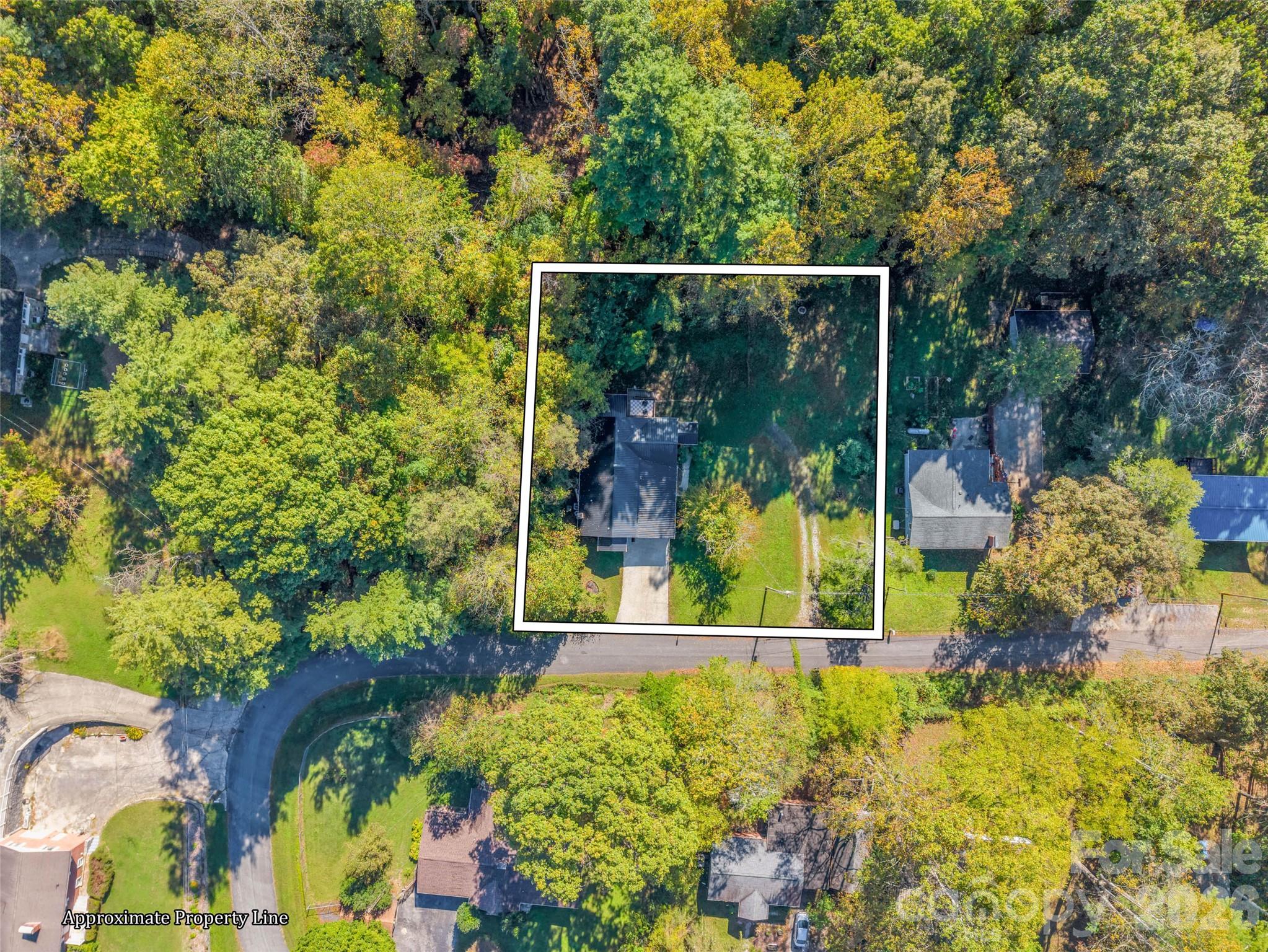 An aerial perspective of the home and surrounding property. - 913 Dorothy Street, Hendersonville