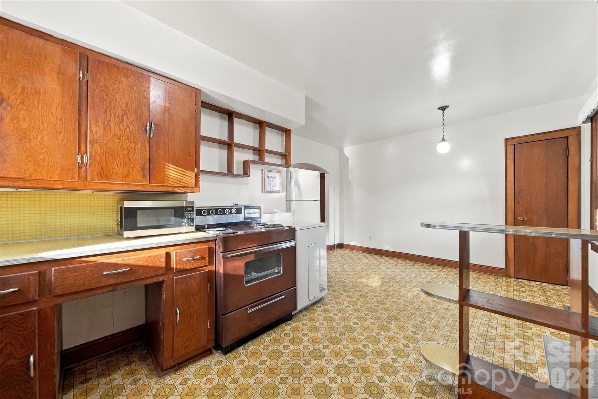 Room for your table & chairs. Also includes a pantry/broom closet. - 203 W 21st Street, Newton