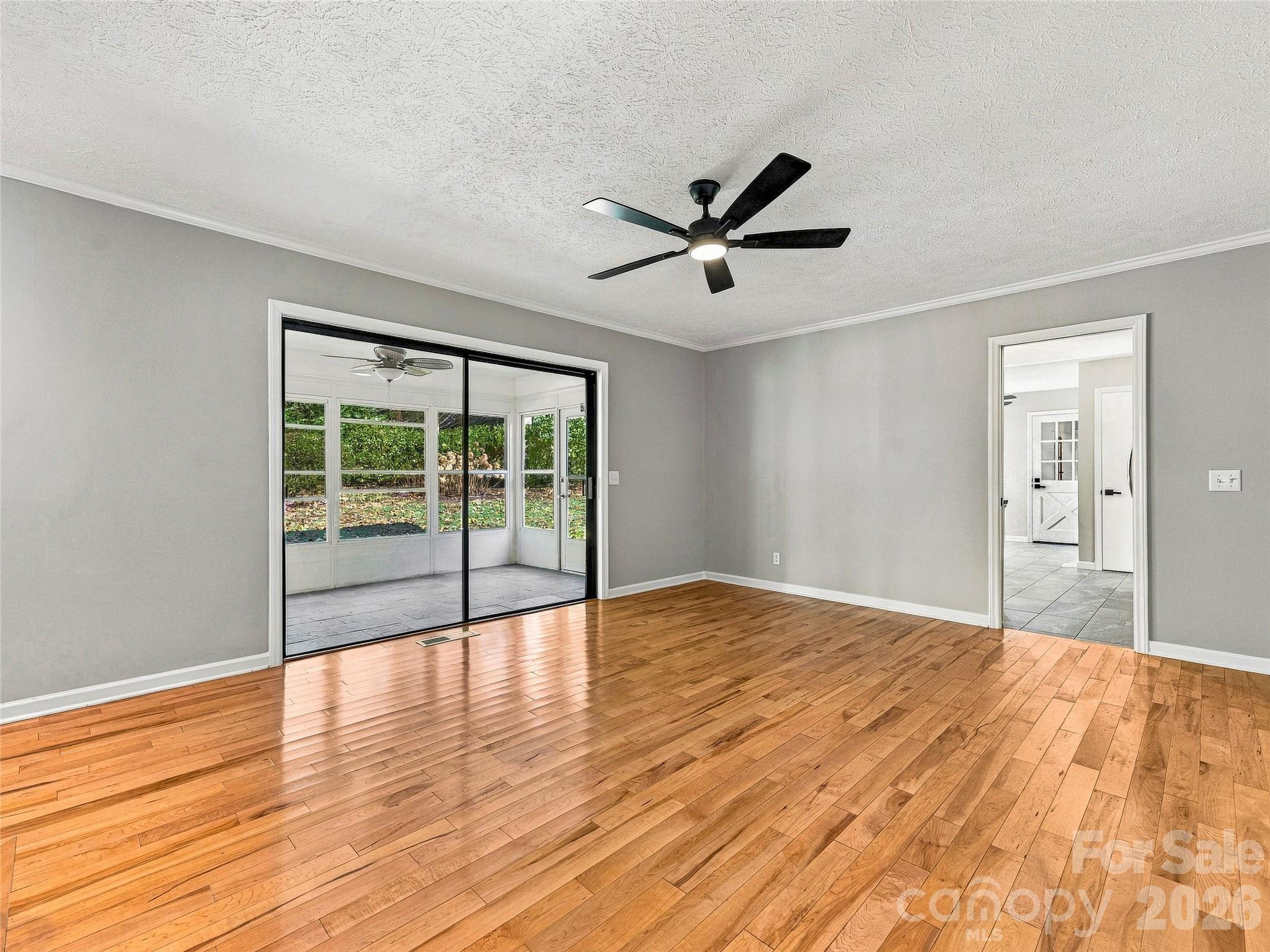 Sliding Doors in Den Open to Sunroom - 133 Kent Lane, Hendersonville