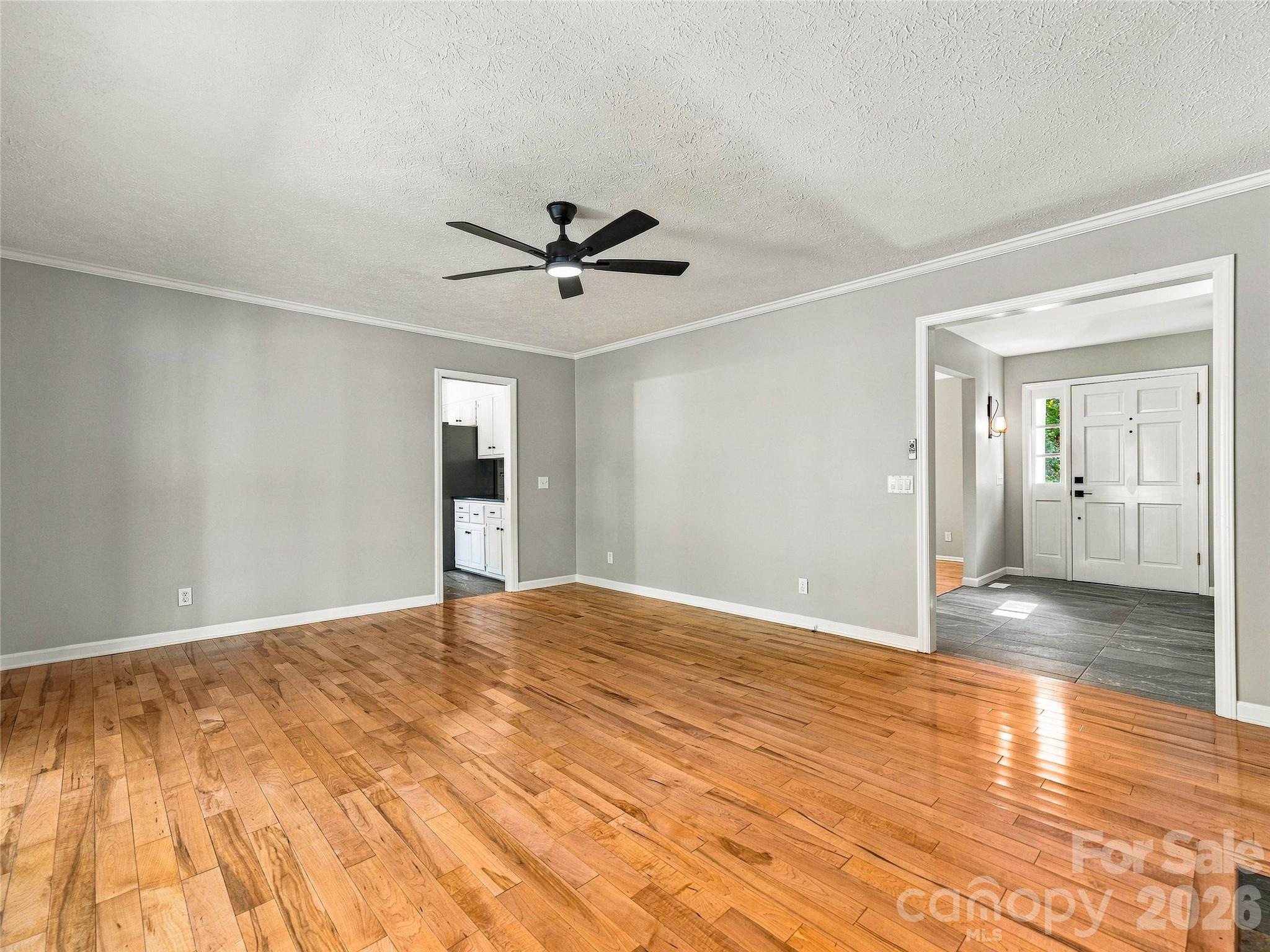 Foyer Flows to Den, Den has Door to Kitchen - 133 Kent Lane, Hendersonville
