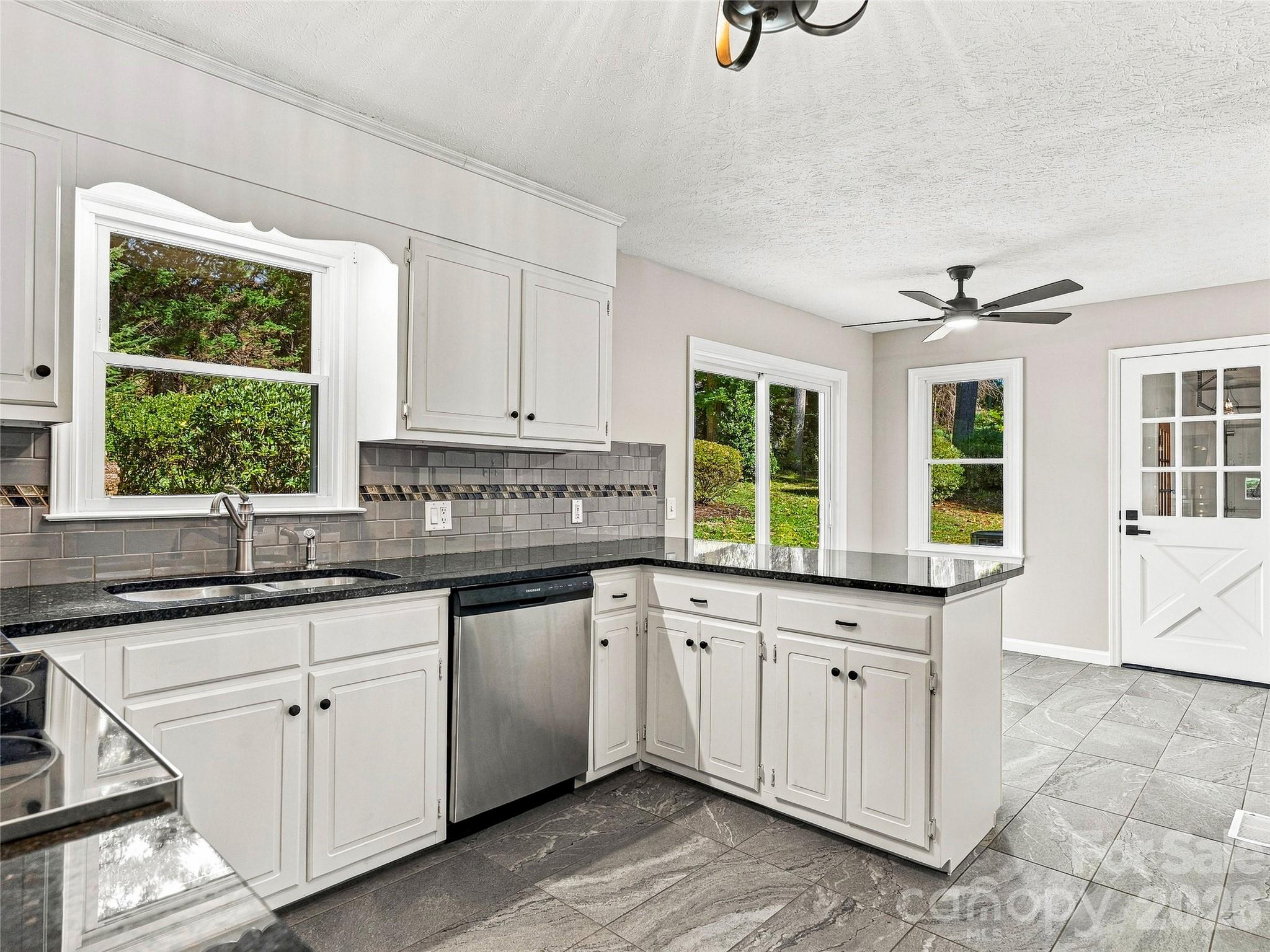 Kitchen has Granite Counters, Breakfast Bar, and Room for Table - 133 Kent Lane, Hendersonville
