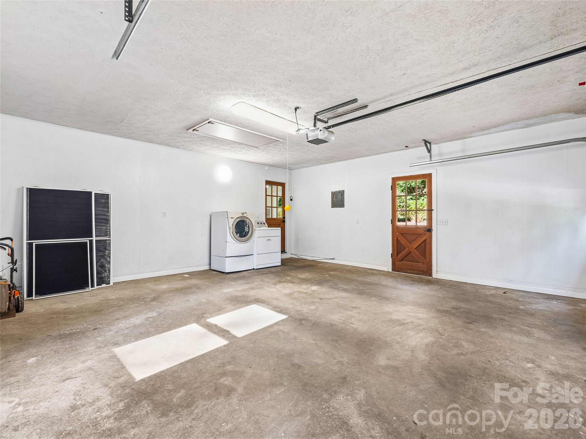 Oversized 2-car Garage has Designated Laundry Area - 133 Kent Lane, Hendersonville