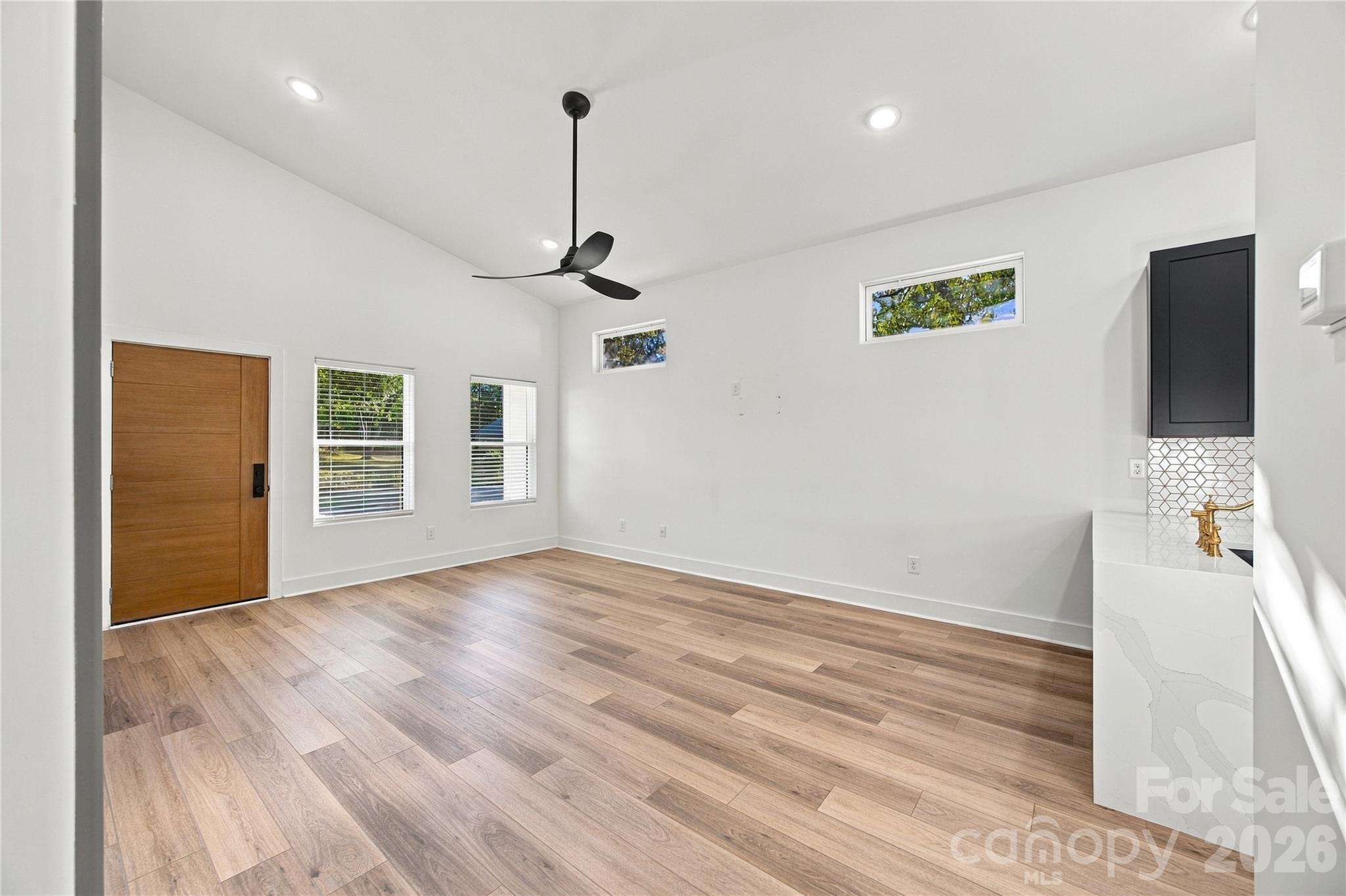 Room for a dining table, couches, and Sunday Football gatherings - 571 Buford Drive SW, Concord