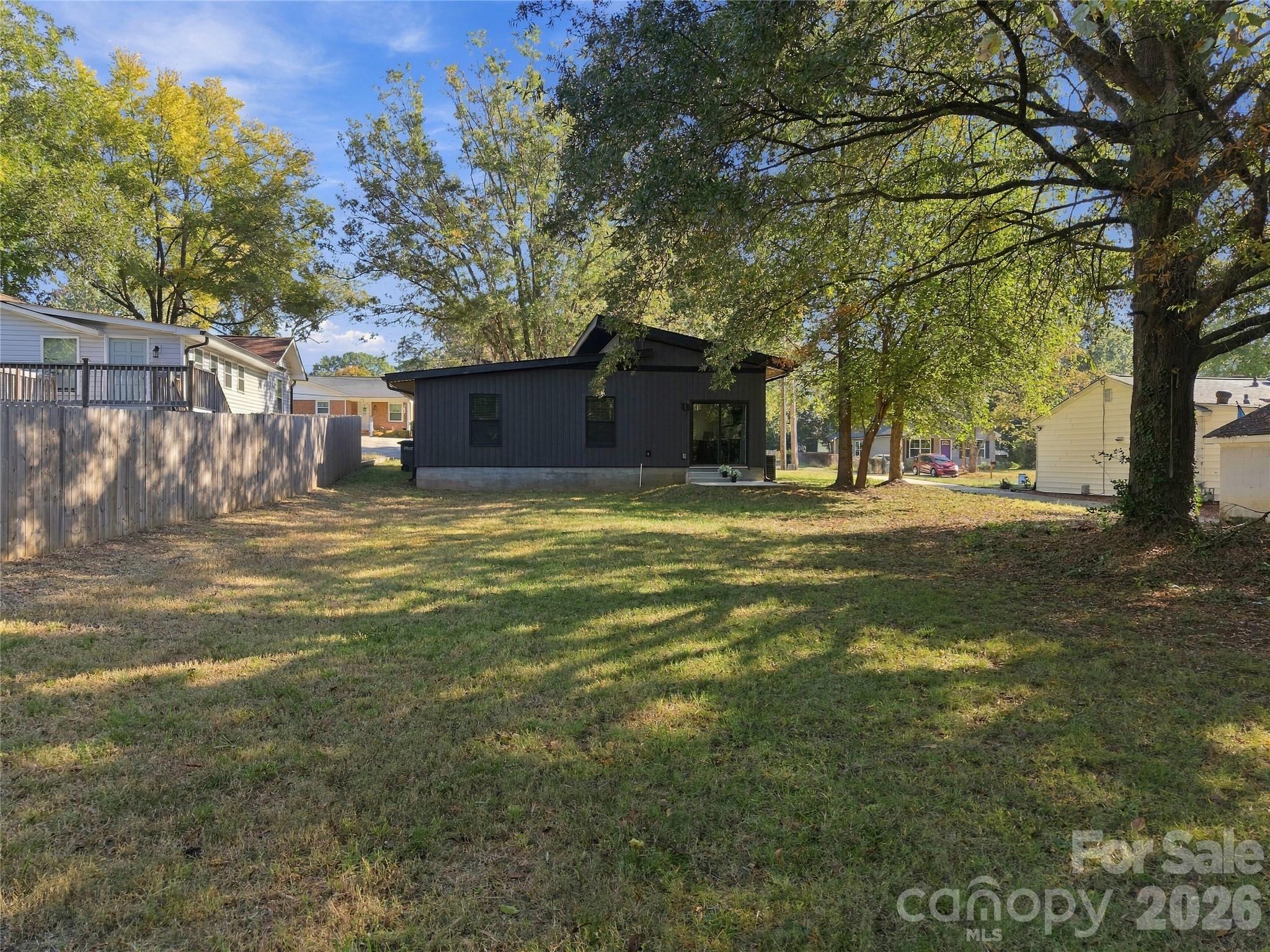 Large, flat backyard for entertaining, gardening and playing - 571 Buford Drive SW, Concord