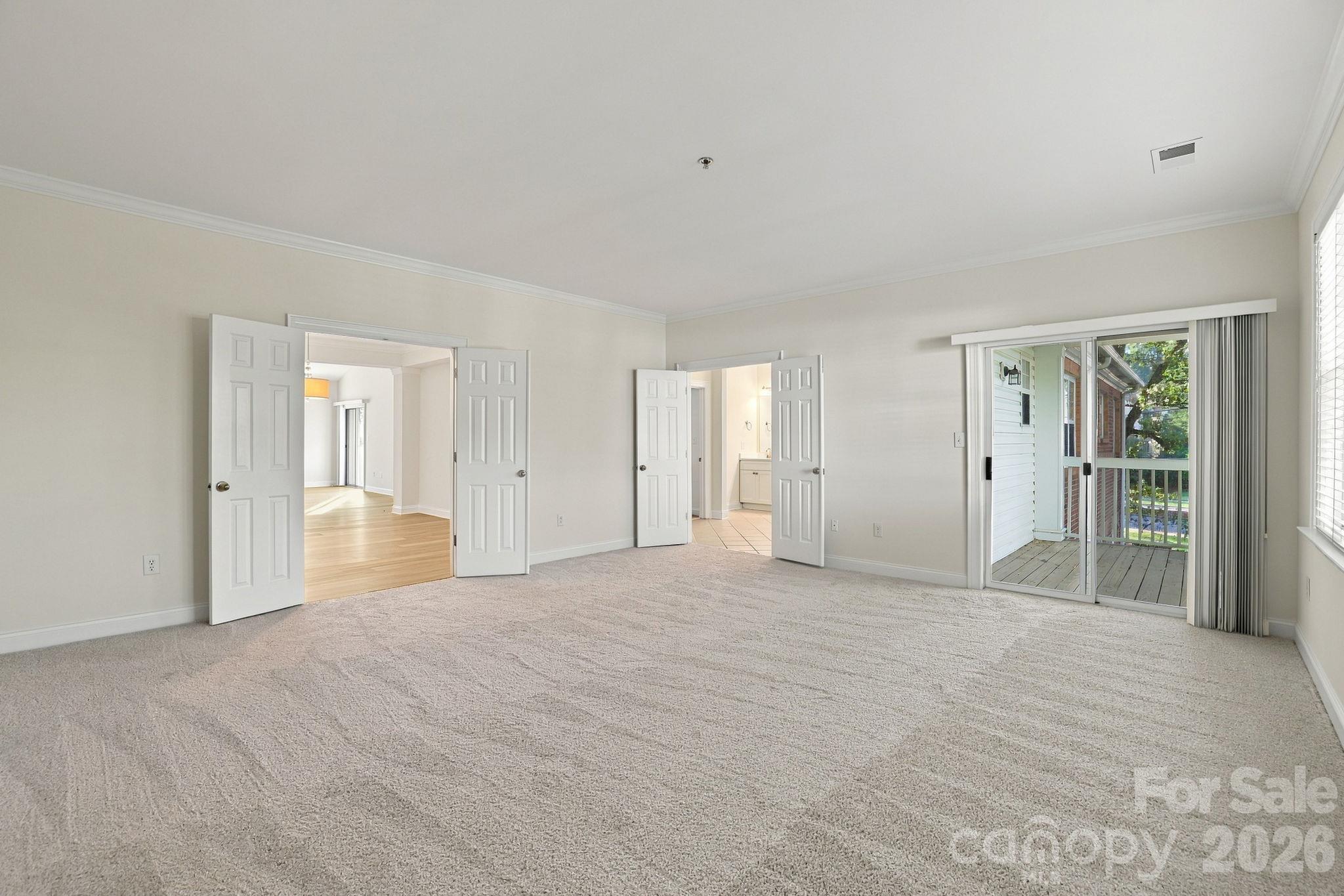 Primary Bedroom with Its Own Balcony - 5601 Fairview Road, Charlotte