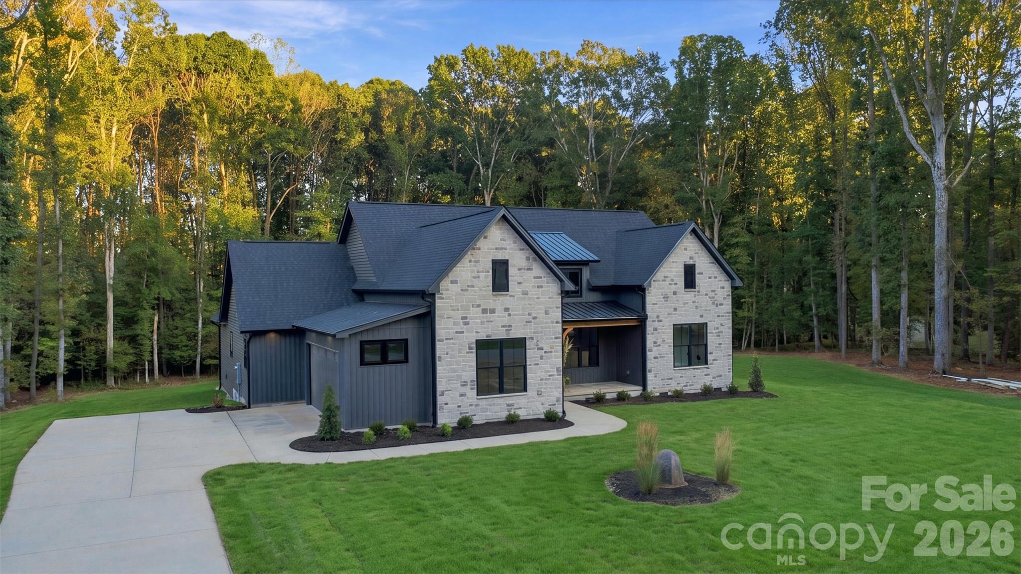 Front with stone - 219 Barra Drive, Waxhaw