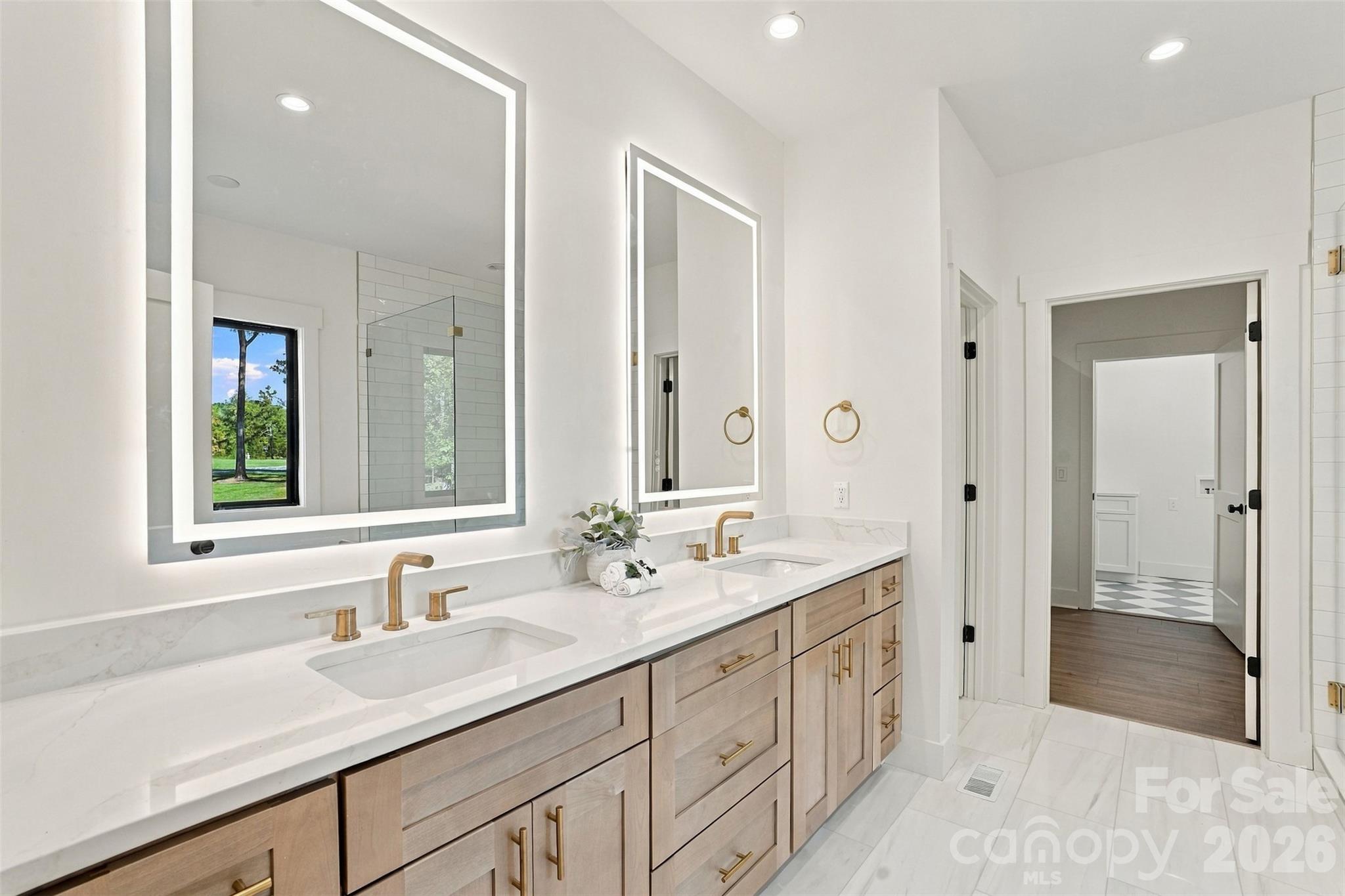 Primary Bath with luxurious Gold Fixtures - 219 Barra Drive, Waxhaw