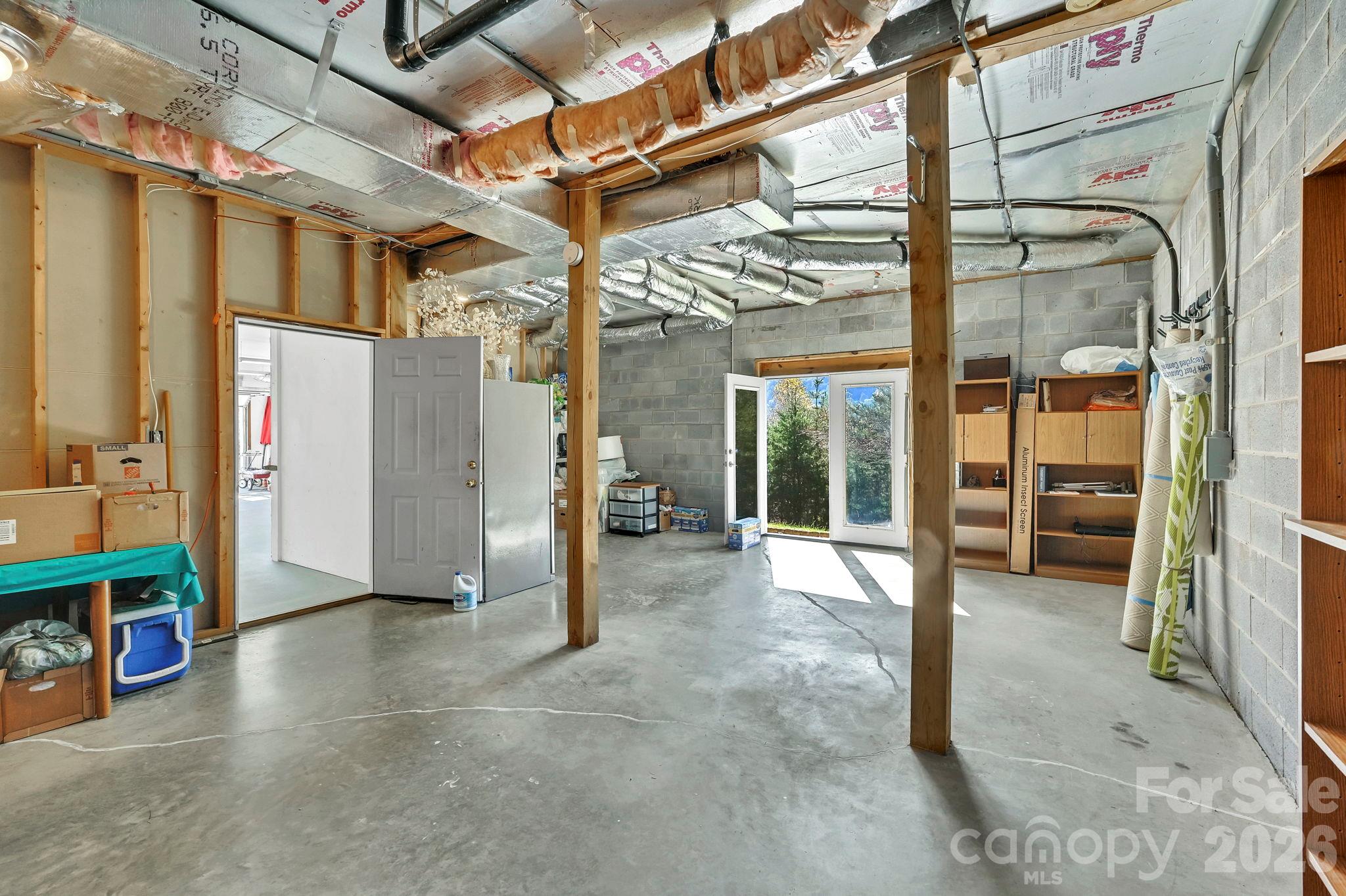 Large unfinshed basement with french doors to front yard - 85 Hidden Meadow Drive, Candler