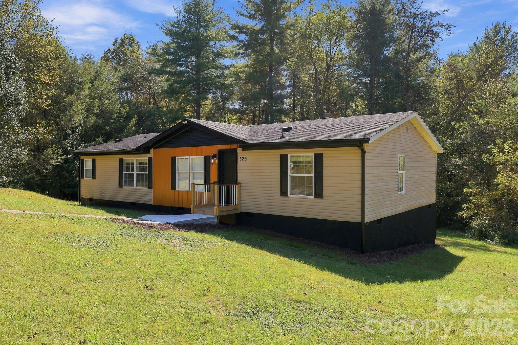 Single Family Residence at 323 Dogwood Road, Candler, photo 2 of 34
