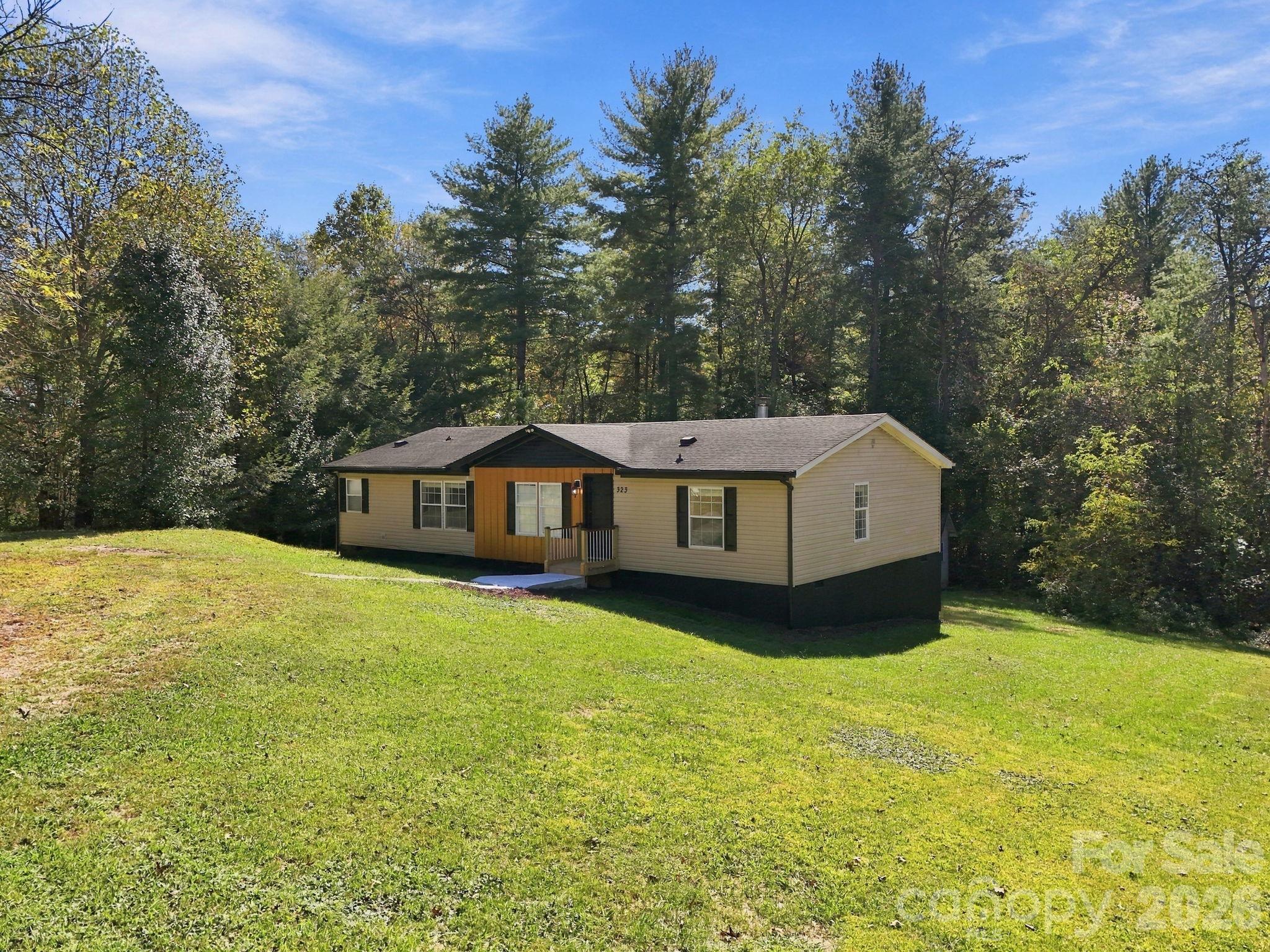 Single Family Residence at 323 Dogwood Road, Candler, photo 4 of 34