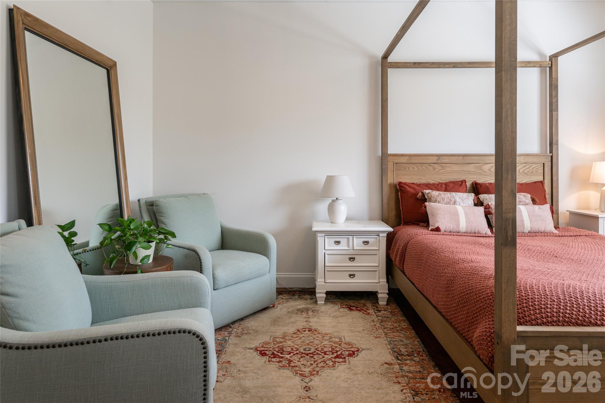 Primary bedroom with a dedicated sitting area and direct access to the en-suite bath. - 17 Asher Lane, Arden