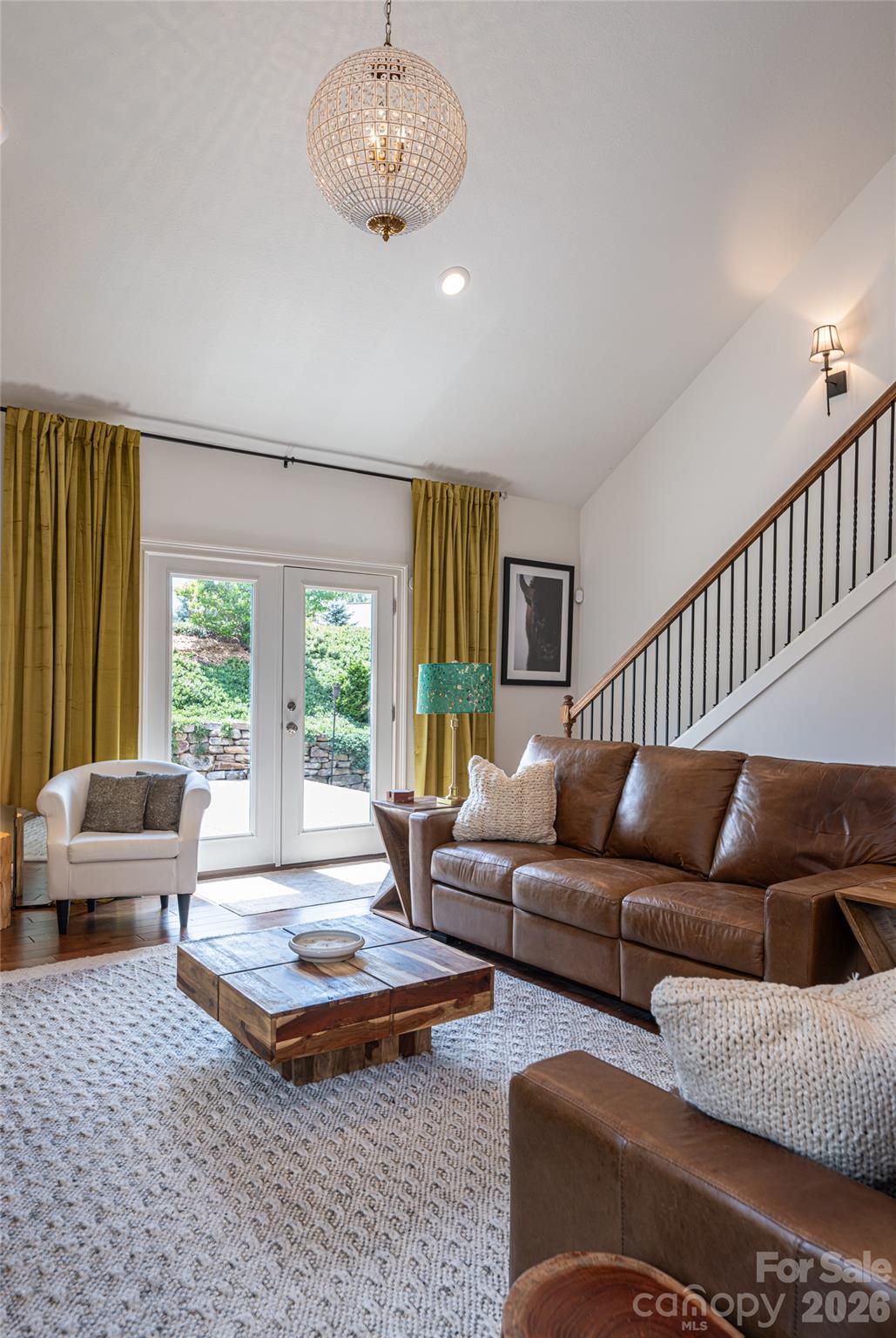 Great room seating area with soaring windows and floor-length drapery. - 17 Asher Lane, Arden