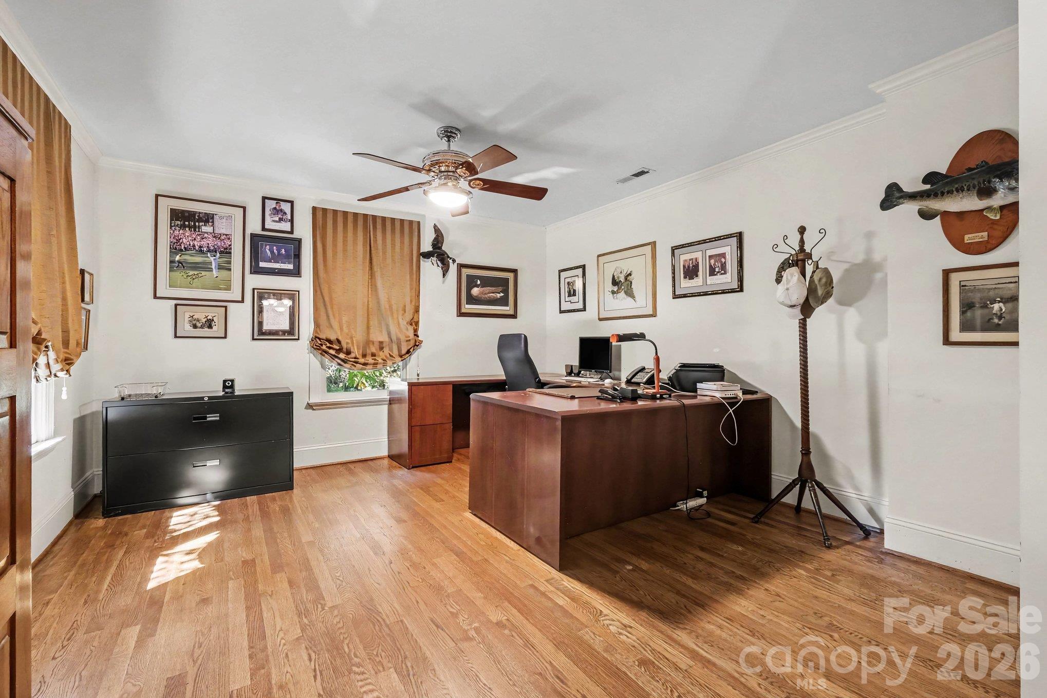 Versatile executive office connects to the library - can also function as a nursery, playroom, collectibles showcase, or potential 5th bedroom (just add a wardrobe!) - 746 Grandview Drive NE, Concord