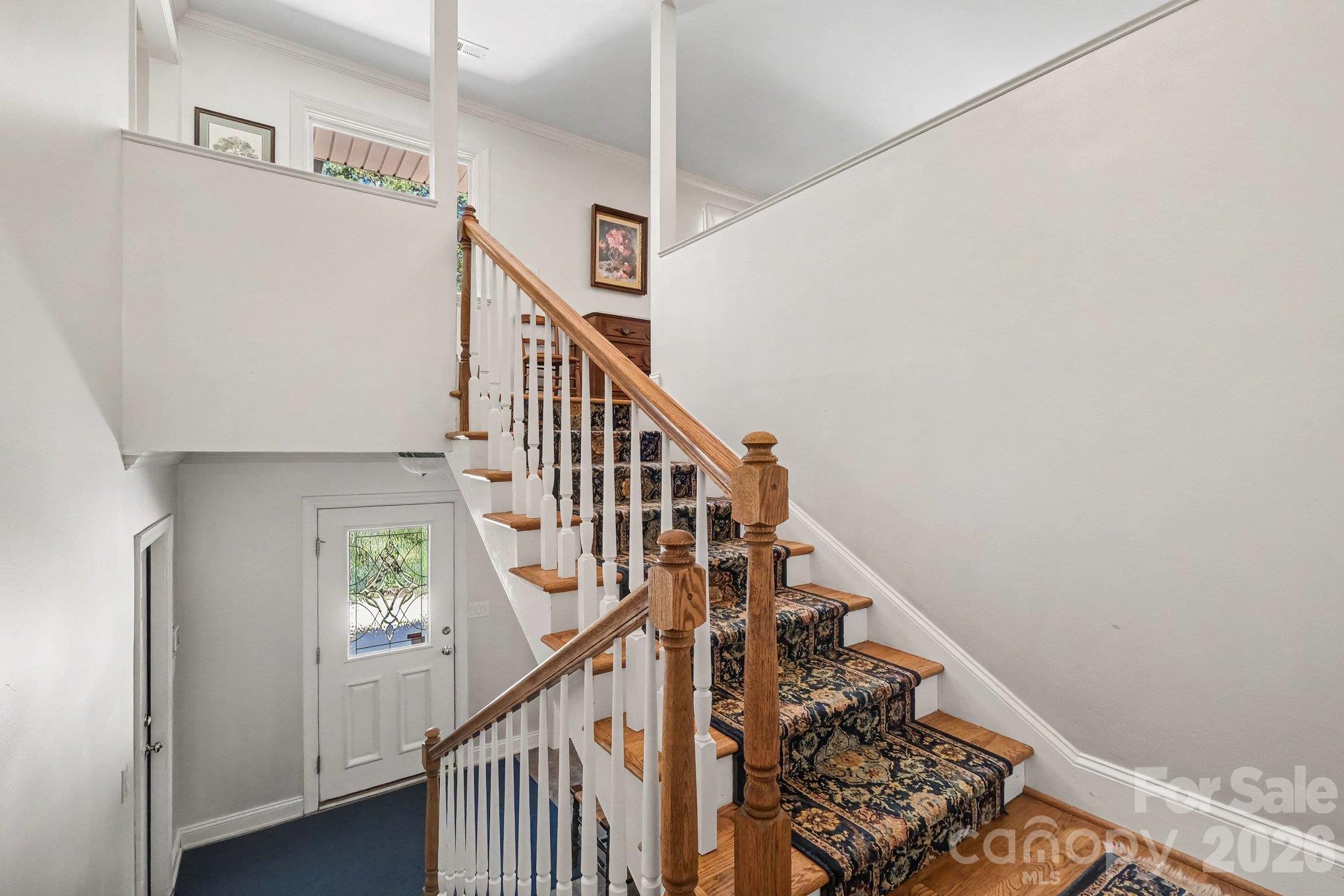 Wide, easy-rise stairs connect the main and lower level - 746 Grandview Drive NE, Concord