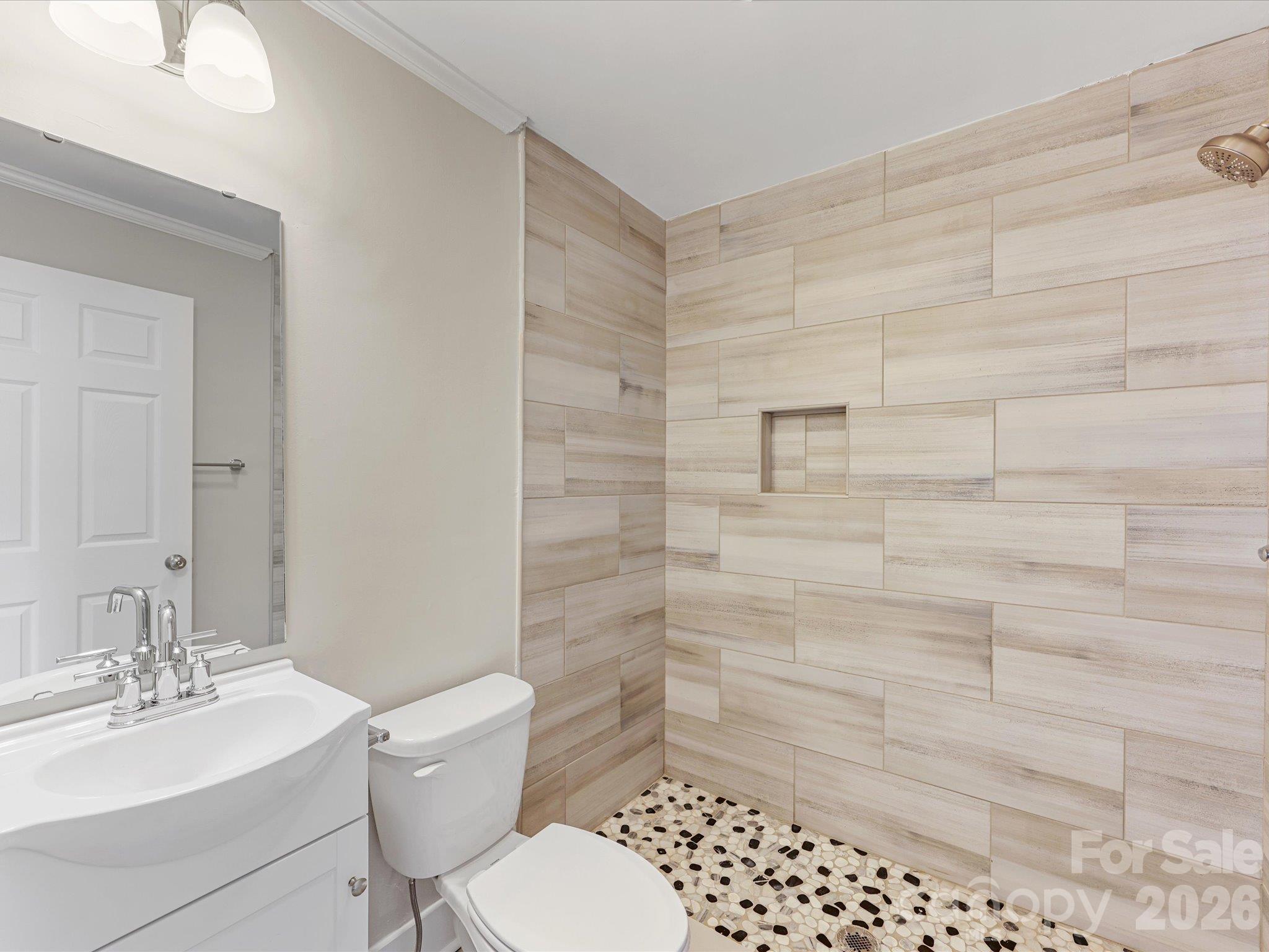 Primary bathroom has designer tiled shower - 721 Broad Street, Kannapolis