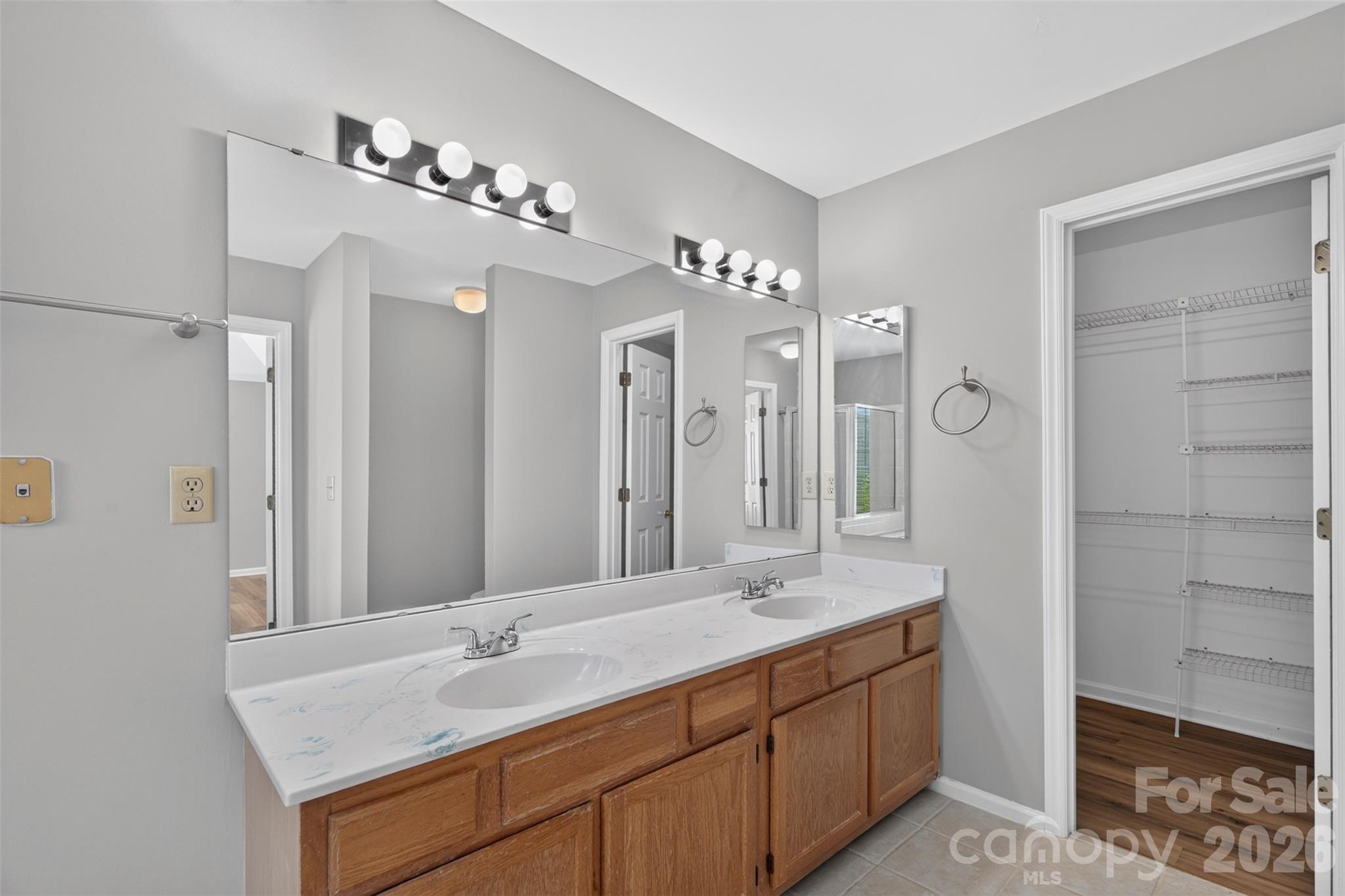 Primary Bath to Walk In Closet - 12427 Woodside Falls Road, Pineville