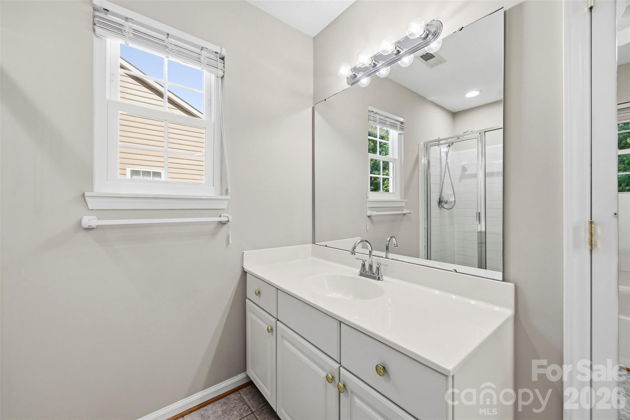 Dual vanity in primary bathroom - 9014 Pickering Grove Lane, Charlotte