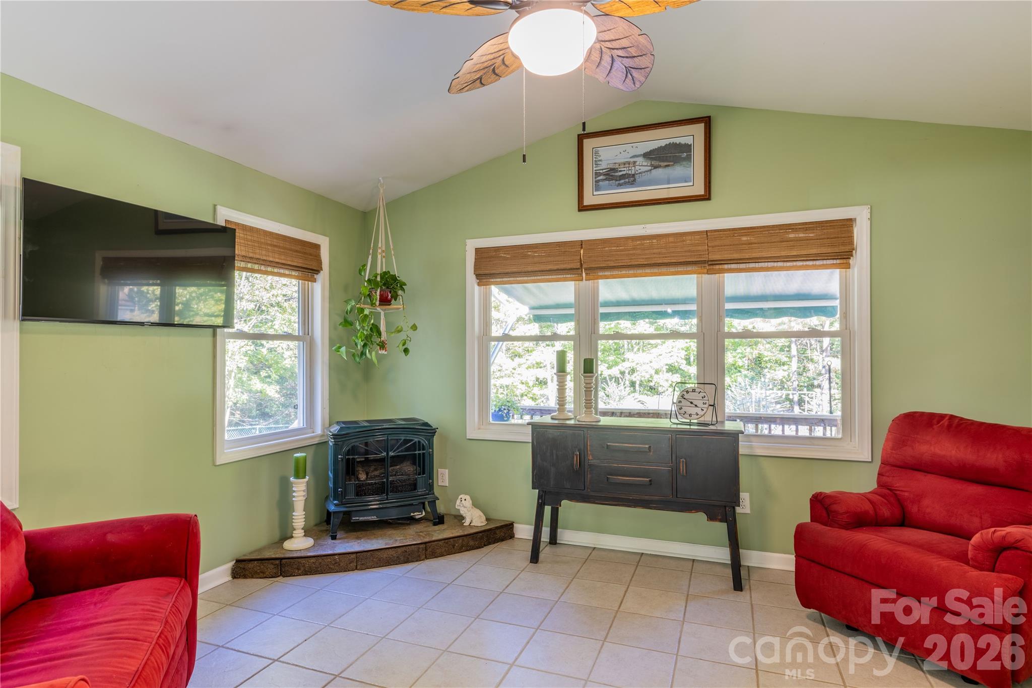 Love this sunroom, just off kitchen with Buck Stove Propane Heater to truly enjoy the fall in the Uwharries. - 571 Newport Drive, Mount Gilead