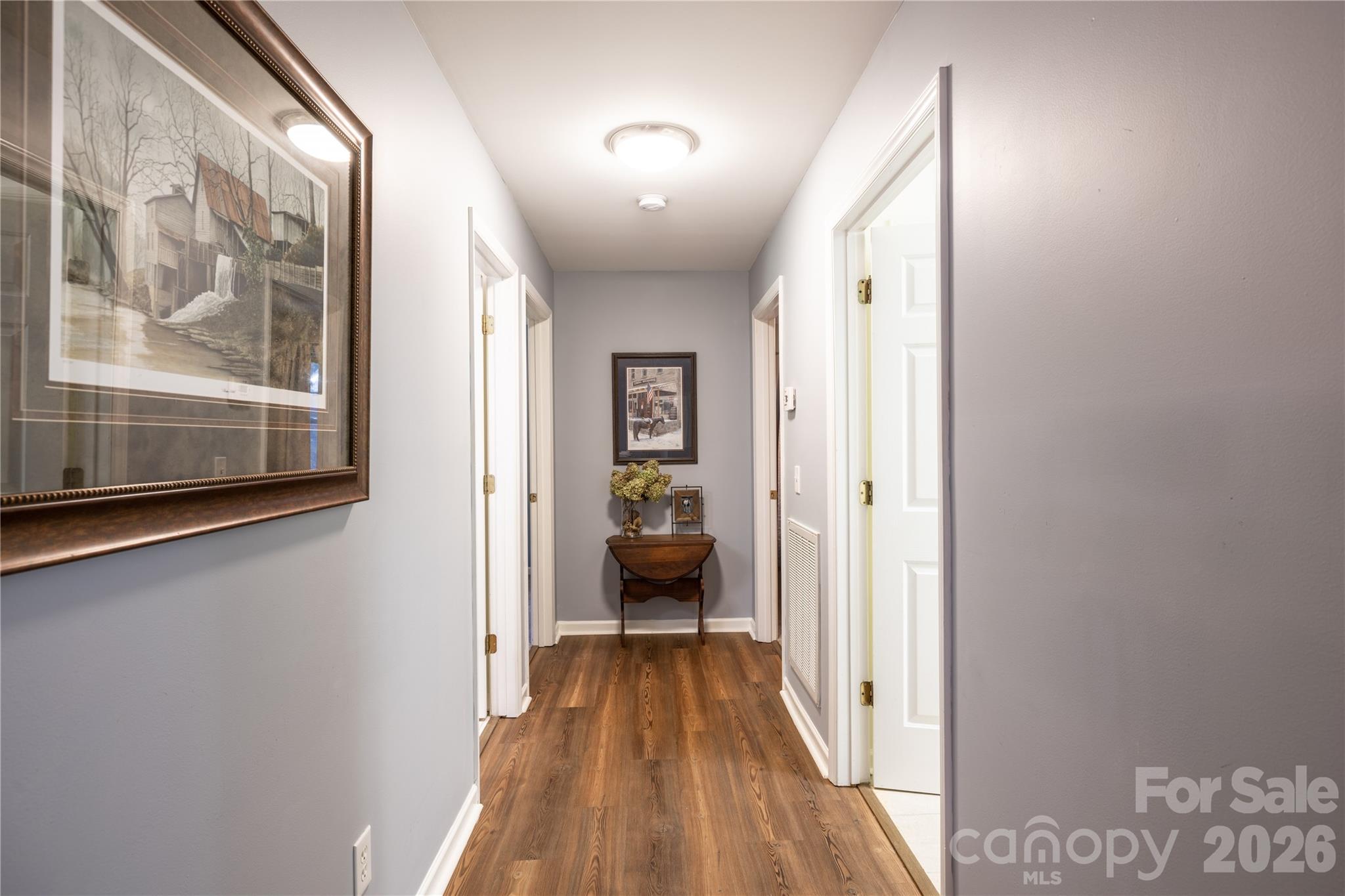 Extra wide Hallway leading to guest bedrooms, bath, and laundry room - 571 Newport Drive, Mount Gilead