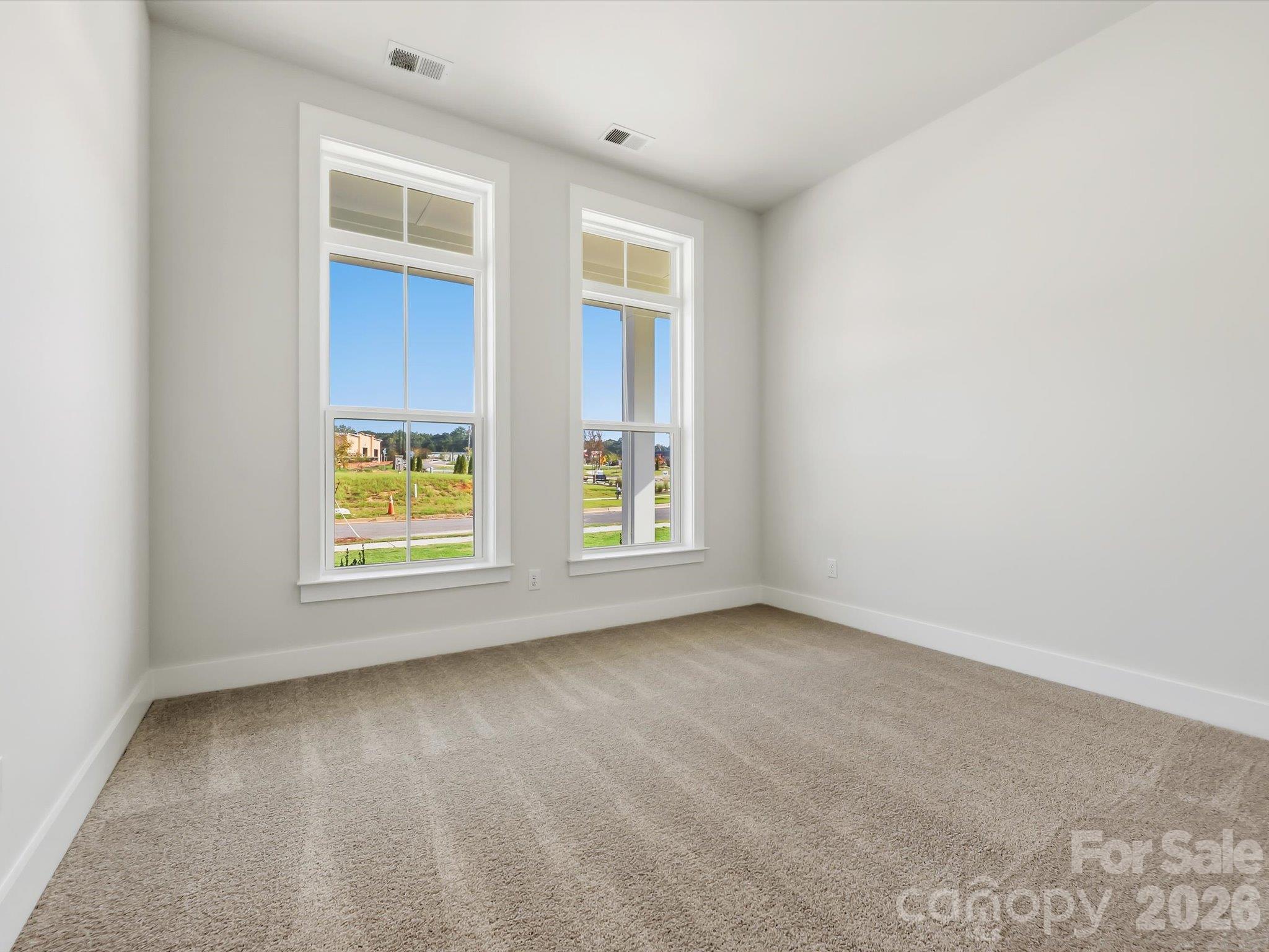 Downstairs bedroom with oversized windows - 558 Cape Cod Way, Rock Hill