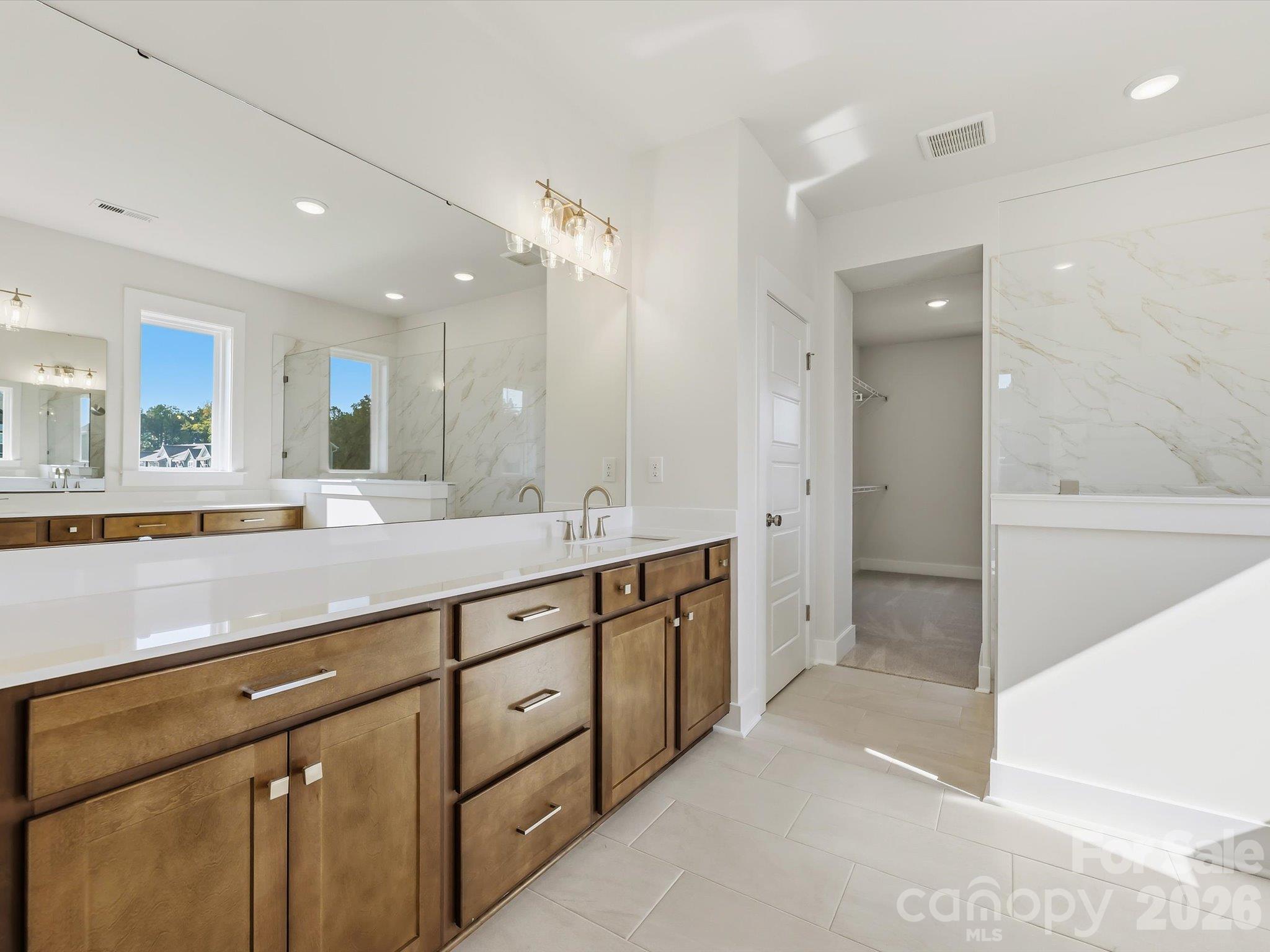 Owner's En Suite Bathroom with separate double vanities! - 558 Cape Cod Way, Rock Hill