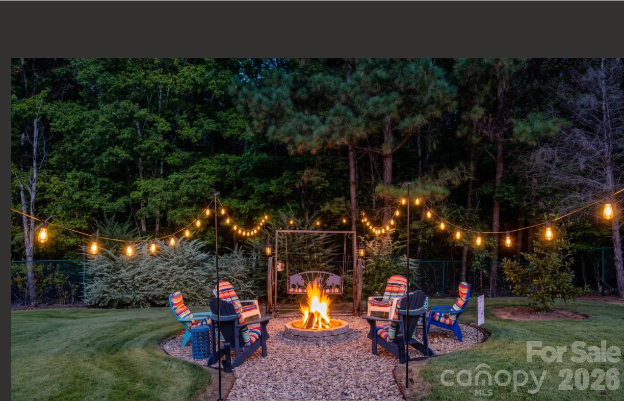 Enhanced nightime lighting   of firepit area in backyard... - 571 Newport Drive, Mount Gilead