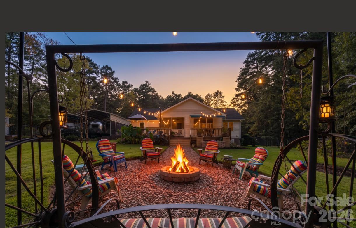 Many fun times are enjoyed around the firepit.....Enhanced nightime of firepit area - 571 Newport Drive, Mount Gilead