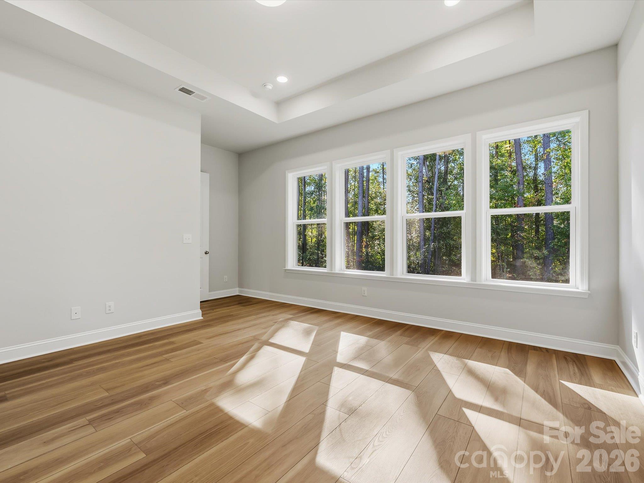 Enjoy panoramic views of tree preserve #3 in owner's suite and LVP floors! - 344 Portree Street, Rock Hill