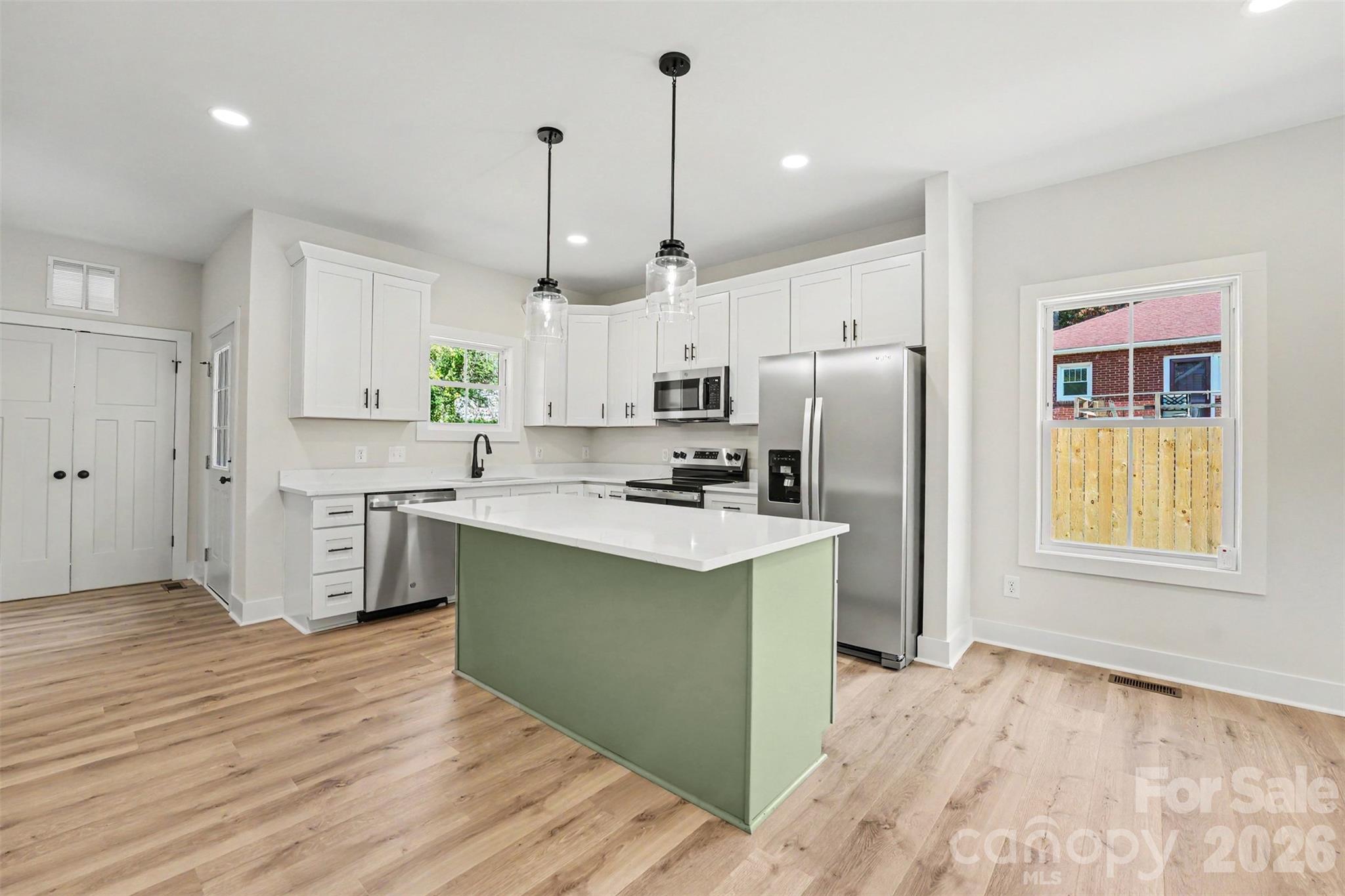 Kitchen with stainless steel appliances - 902 W 8th Street, Kannapolis