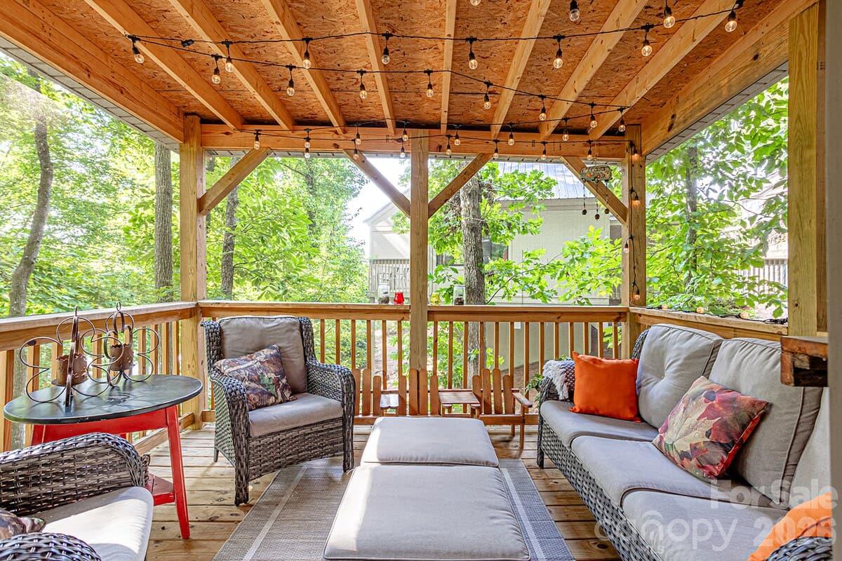 Covered and screened in lounge area - 208 N West Lake Drive, Lake Lure