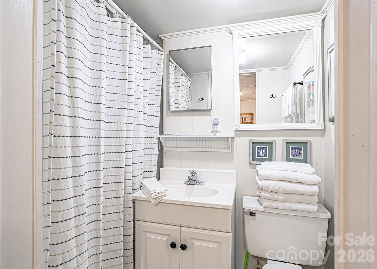 3rd full bath in basement - 208 N West Lake Drive, Lake Lure