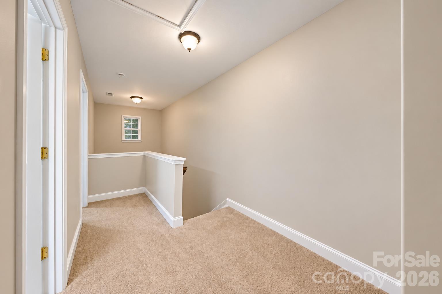 upstairs landing area virtually staged - 511 S Zion Street, Landis