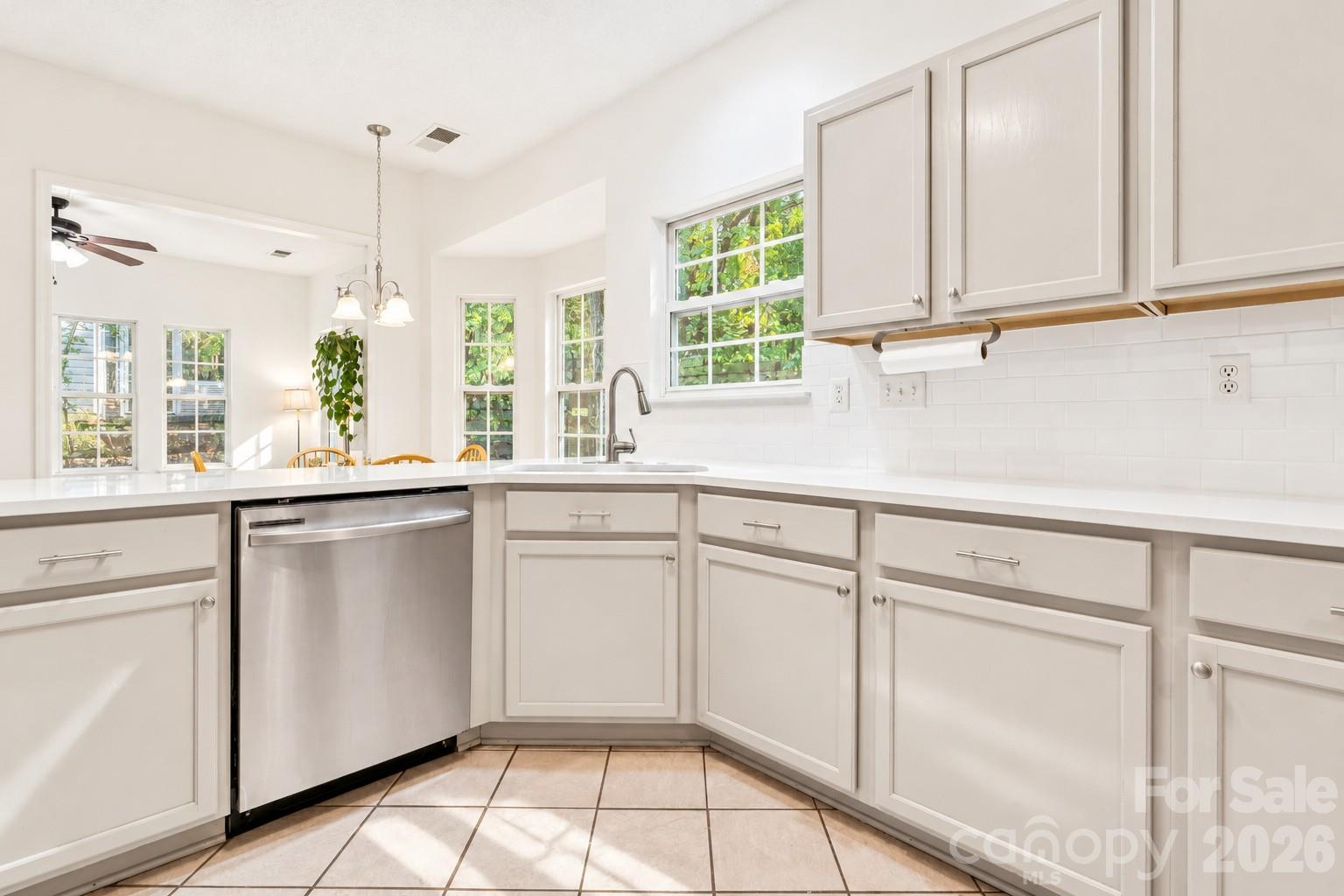 new quartz countertops and subway tile backsplash - 5645 Winslow Avenue NW, Concord