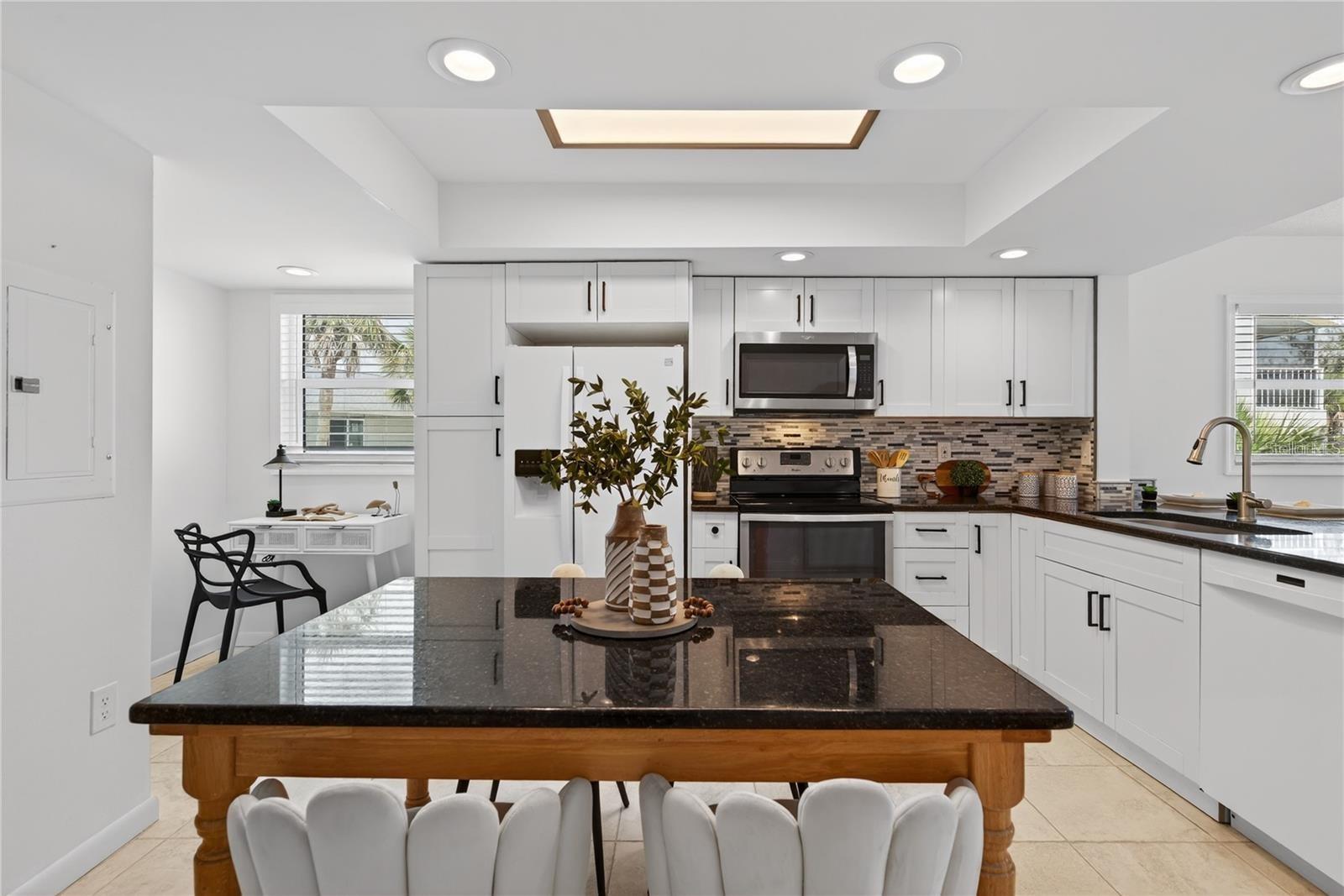 Open Plan Kitchen with Office Nook, Granite Counters and Breakfast Bar - 5031 N BEACH RD #118, ENGLEWOOD