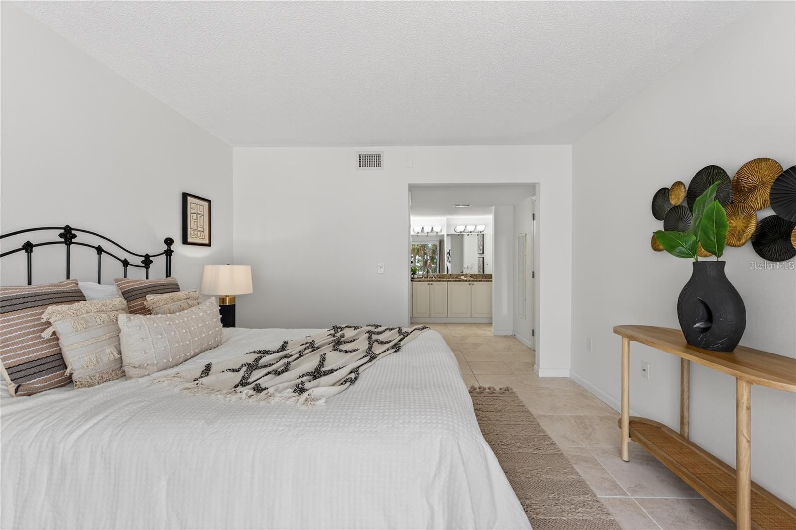 Primary Bedroom with Ensuite Bathroom and Walk-In Closet - 5031 N BEACH RD #118, ENGLEWOOD