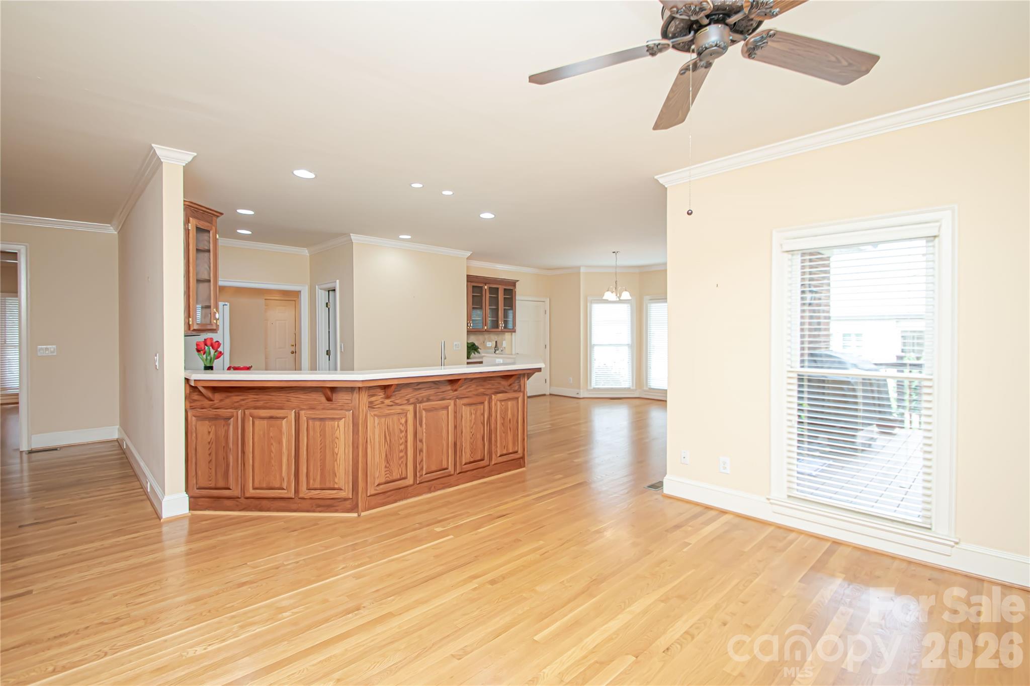 SITTING/OFFICE or FLEX by Kitchen 14'x20': ceiling fan is also pre wired for a ceiling light. Customable area for your family needs. - 5480 Glen Forest Drive, Charlotte